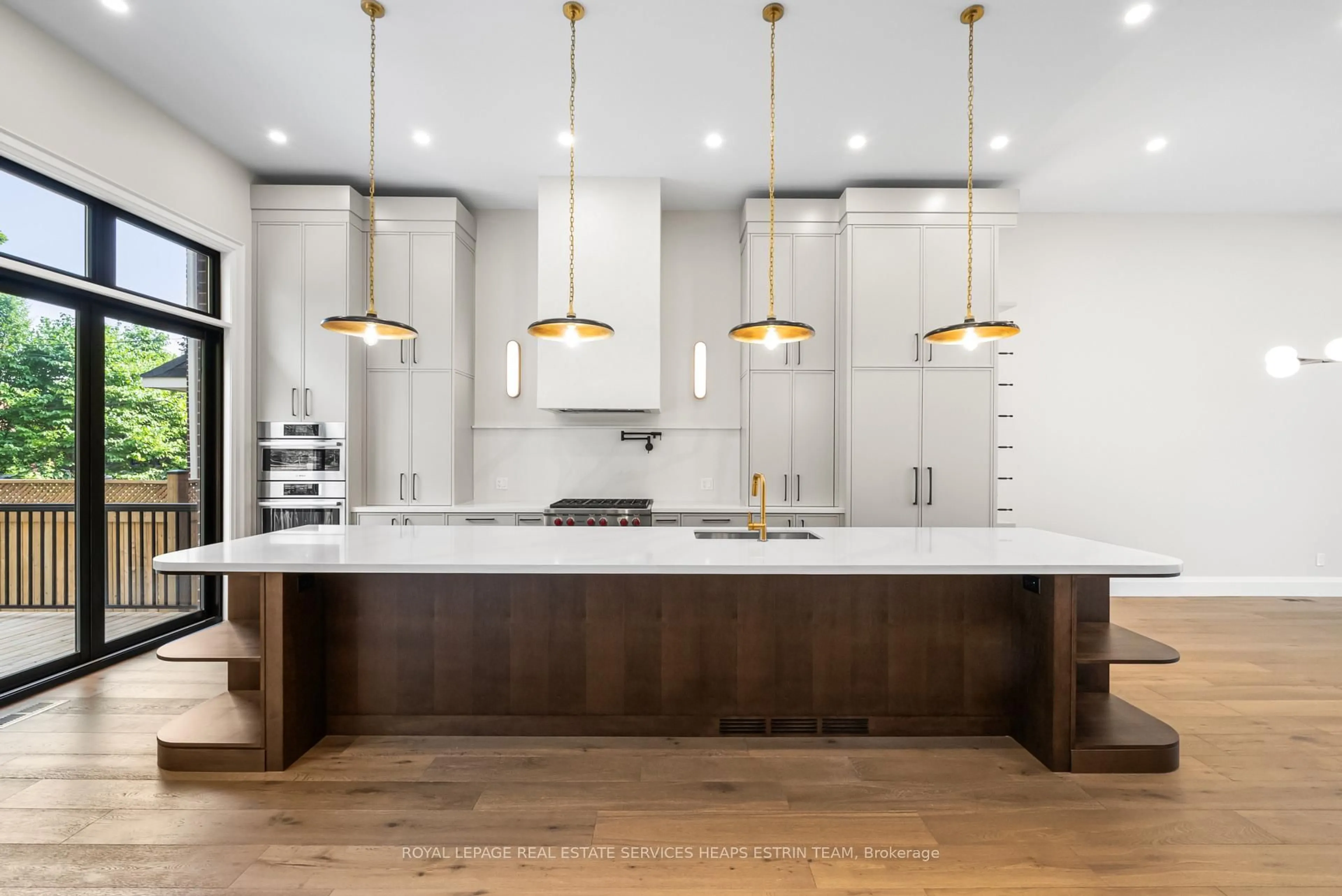Contemporary kitchen, wood/laminate floor for 66 Parkhurst Blvd, Toronto Ontario M4G 2E2