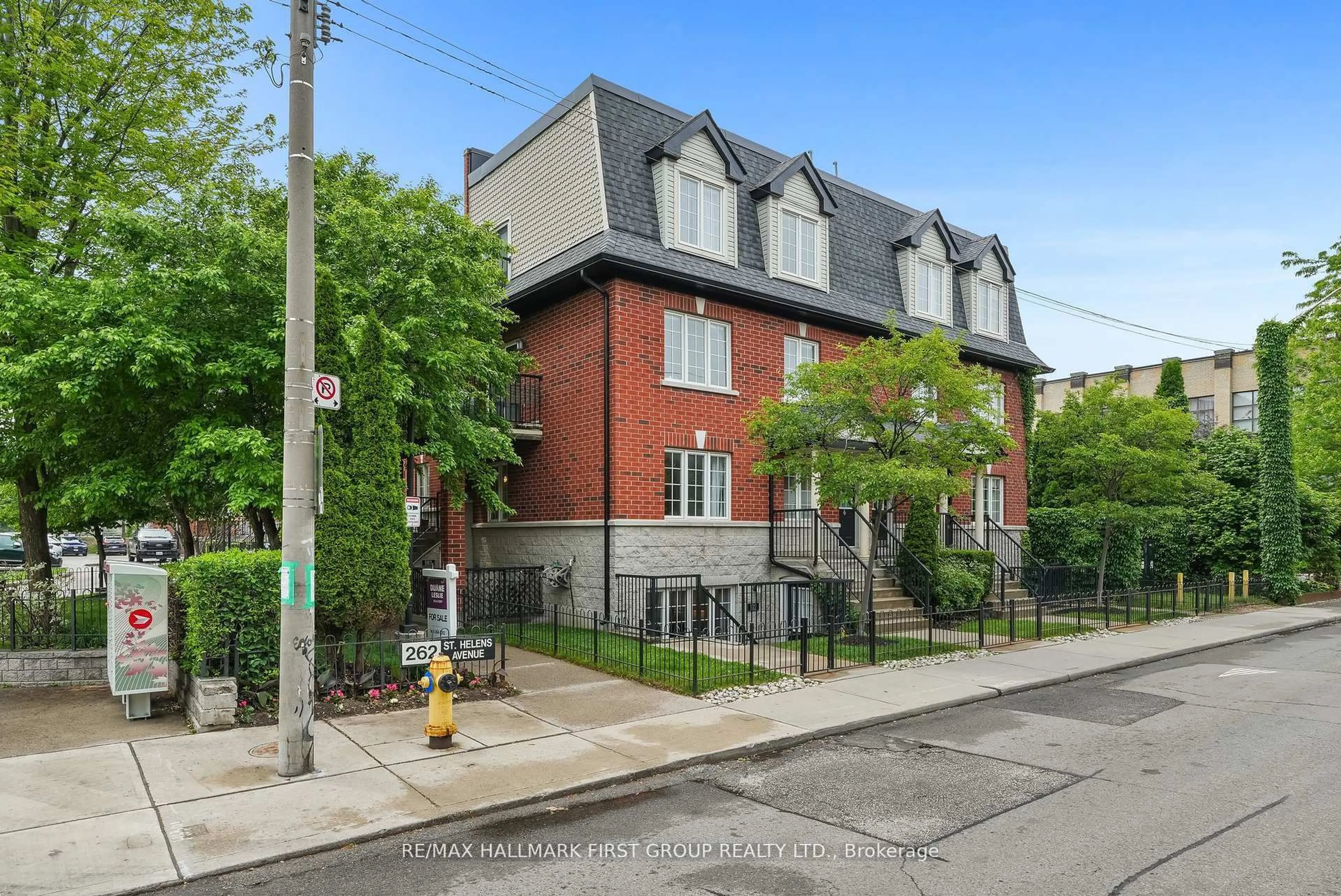 Home with brick exterior material, street for 262 St. Helens Ave #102, Toronto Ontario M6H 4A4