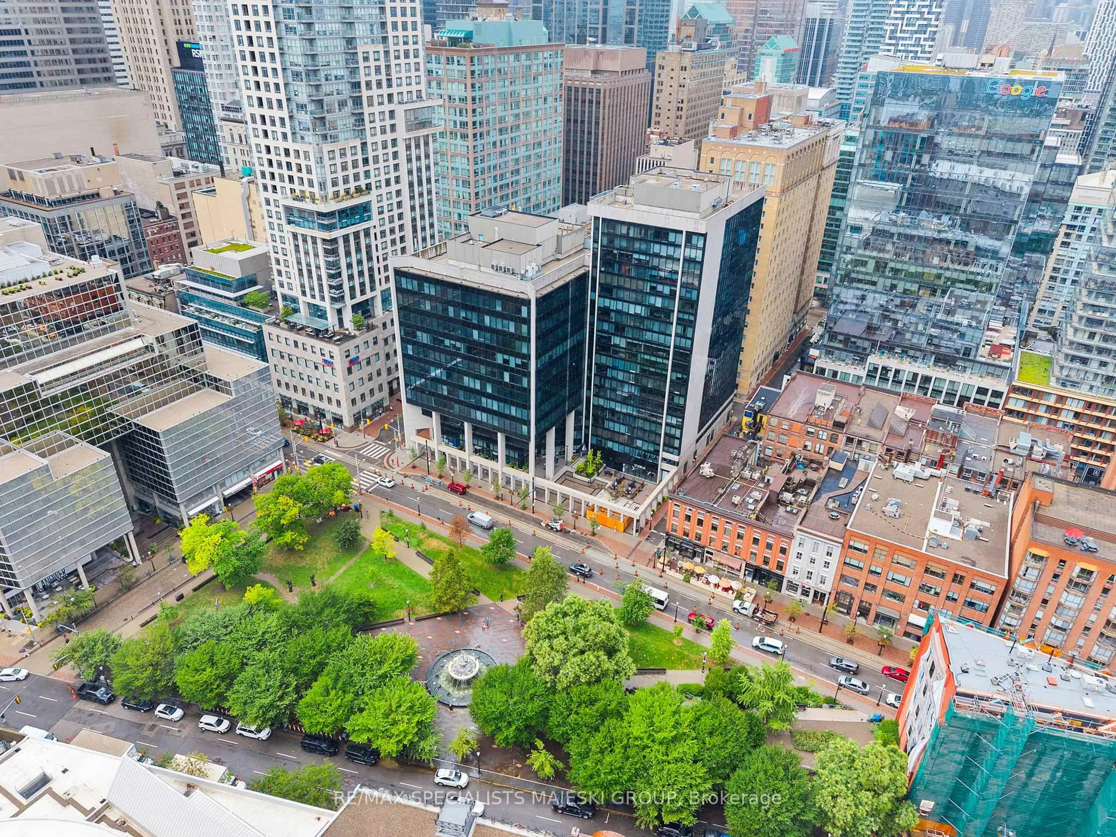 A pic from outside/outdoor area/front of a property/back of a property/a pic from drone, city buildings view from balcony for 30 Wellington St #1005, Toronto Ontario M5E 1S3