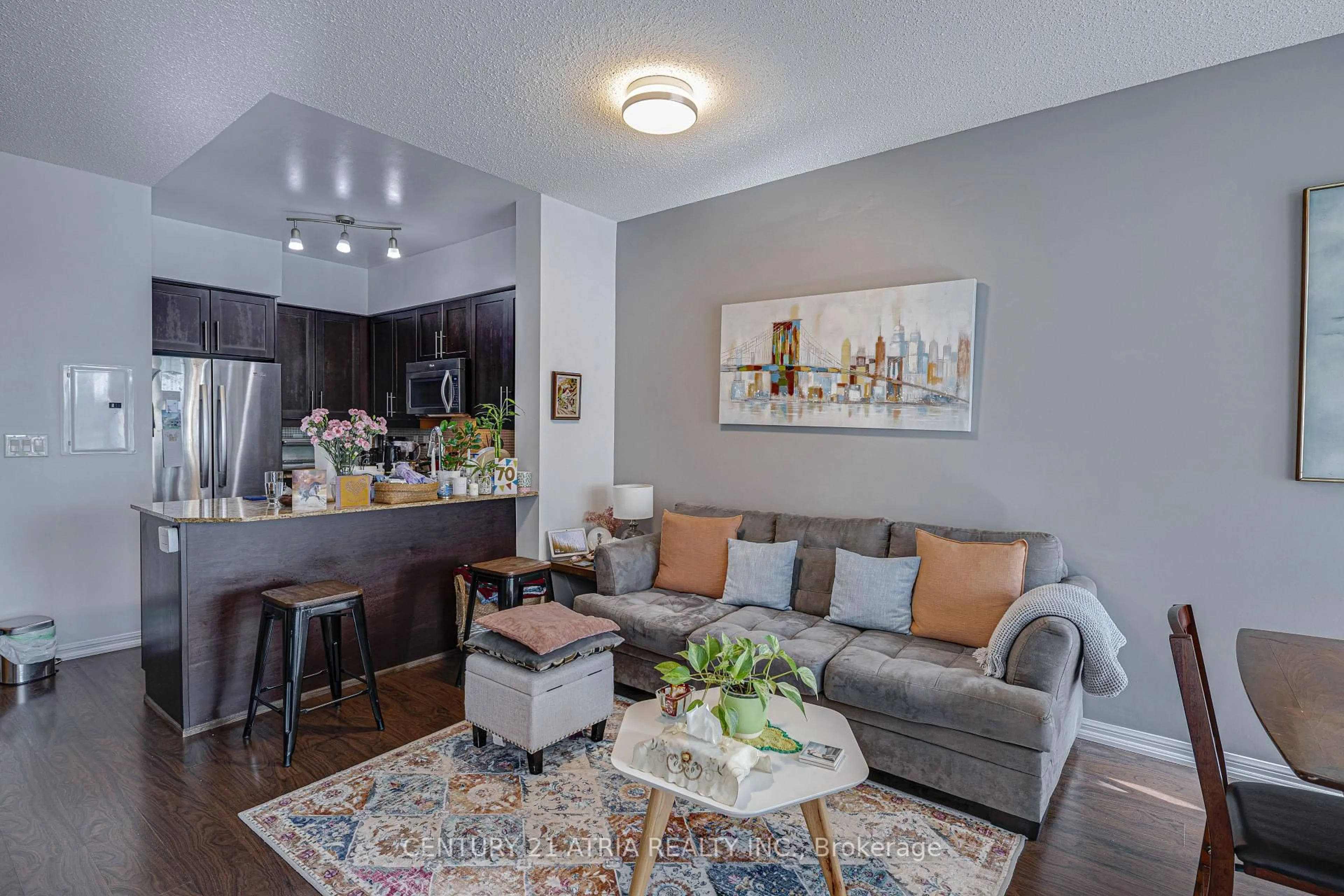 Living room with furniture, wood/laminate floor for 125 Western Battery Rd #2504, Toronto Ontario M6K 3R8