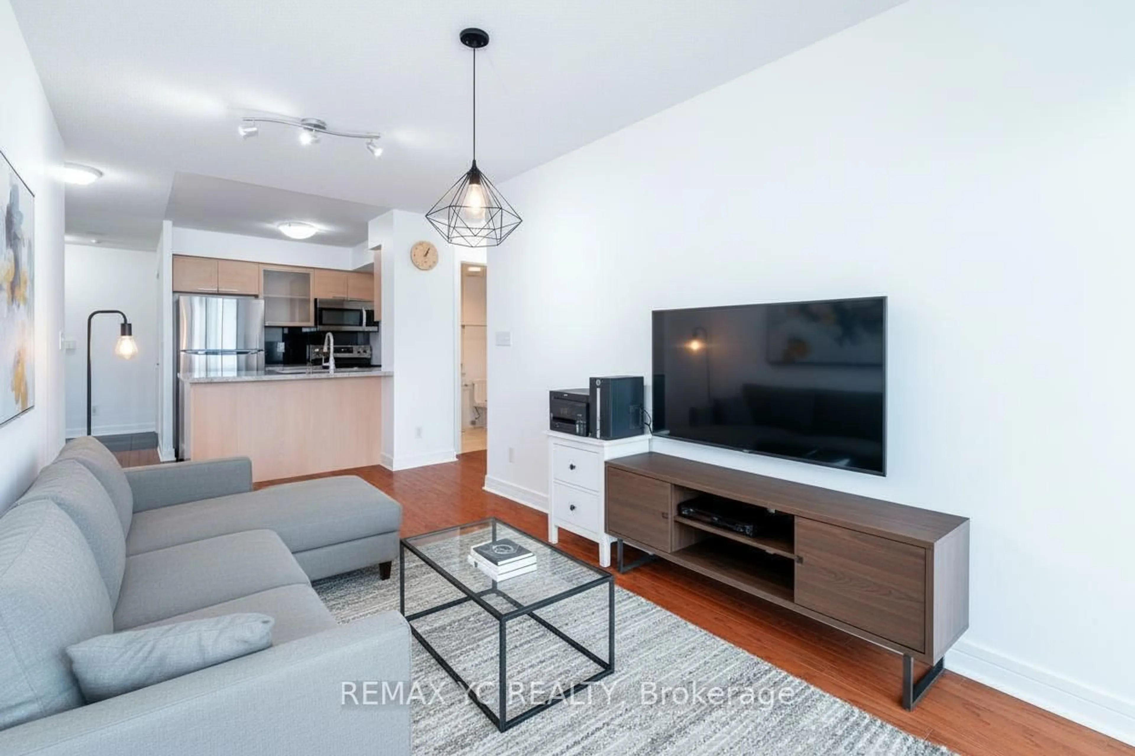 Living room with furniture, wood/laminate floor for 16 Harrison Garden Blvd #2612, Toronto Ontario M2N 7J6