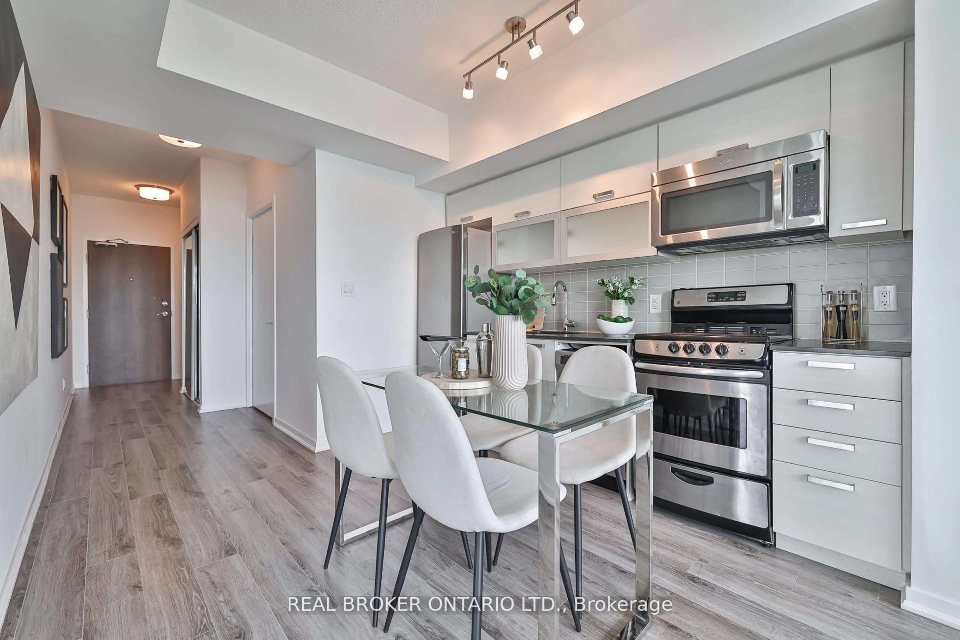 Open concept kitchen, wood/laminate floor for 68 Abell St #1129, Toronto Ontario M6J 0A9