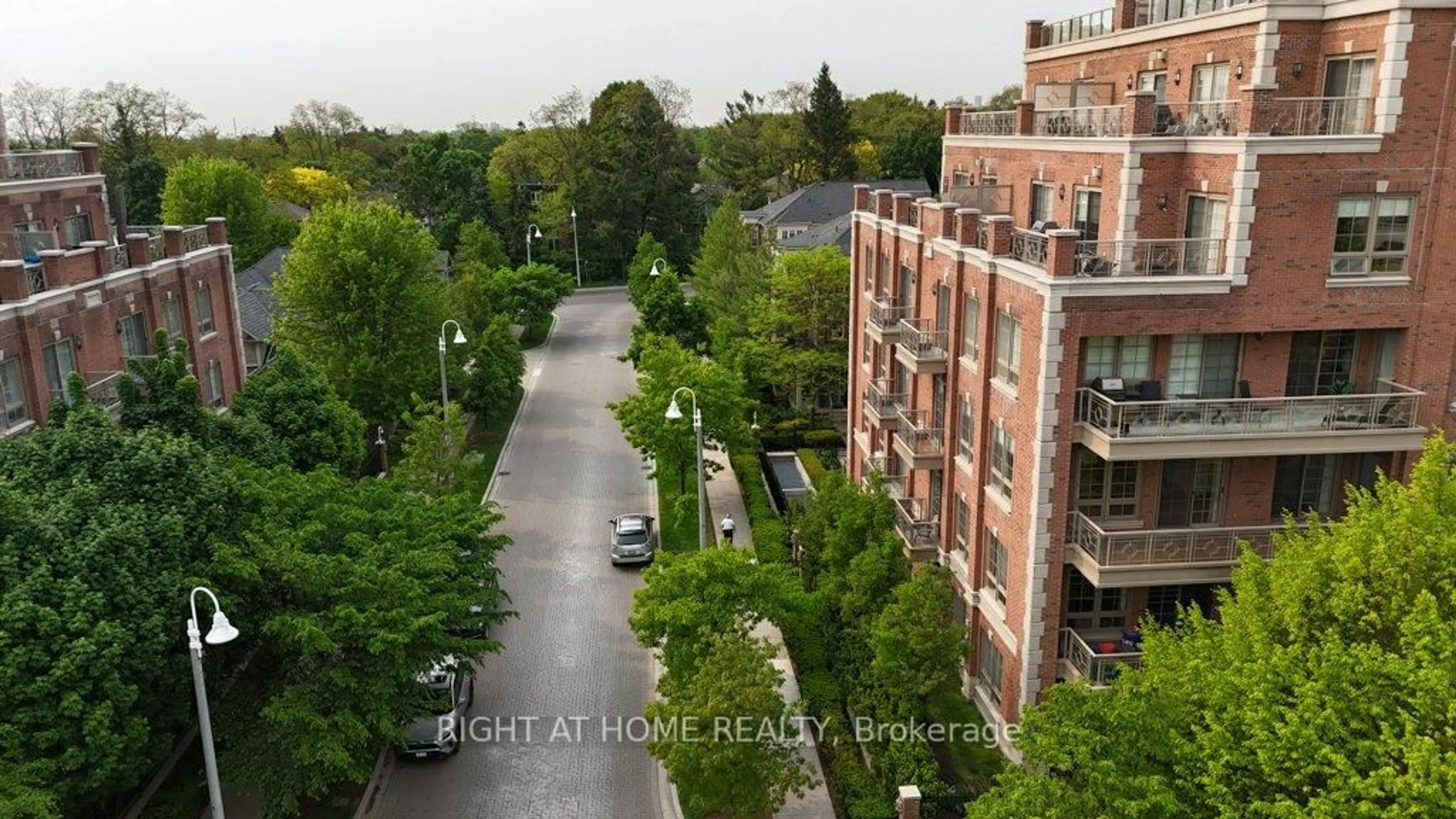 A pic from outside/outdoor area/front of a property/back of a property/a pic from drone, city buildings view from balcony for 20 Burkebrook Pl #216, Toronto Ontario M4G 0A1