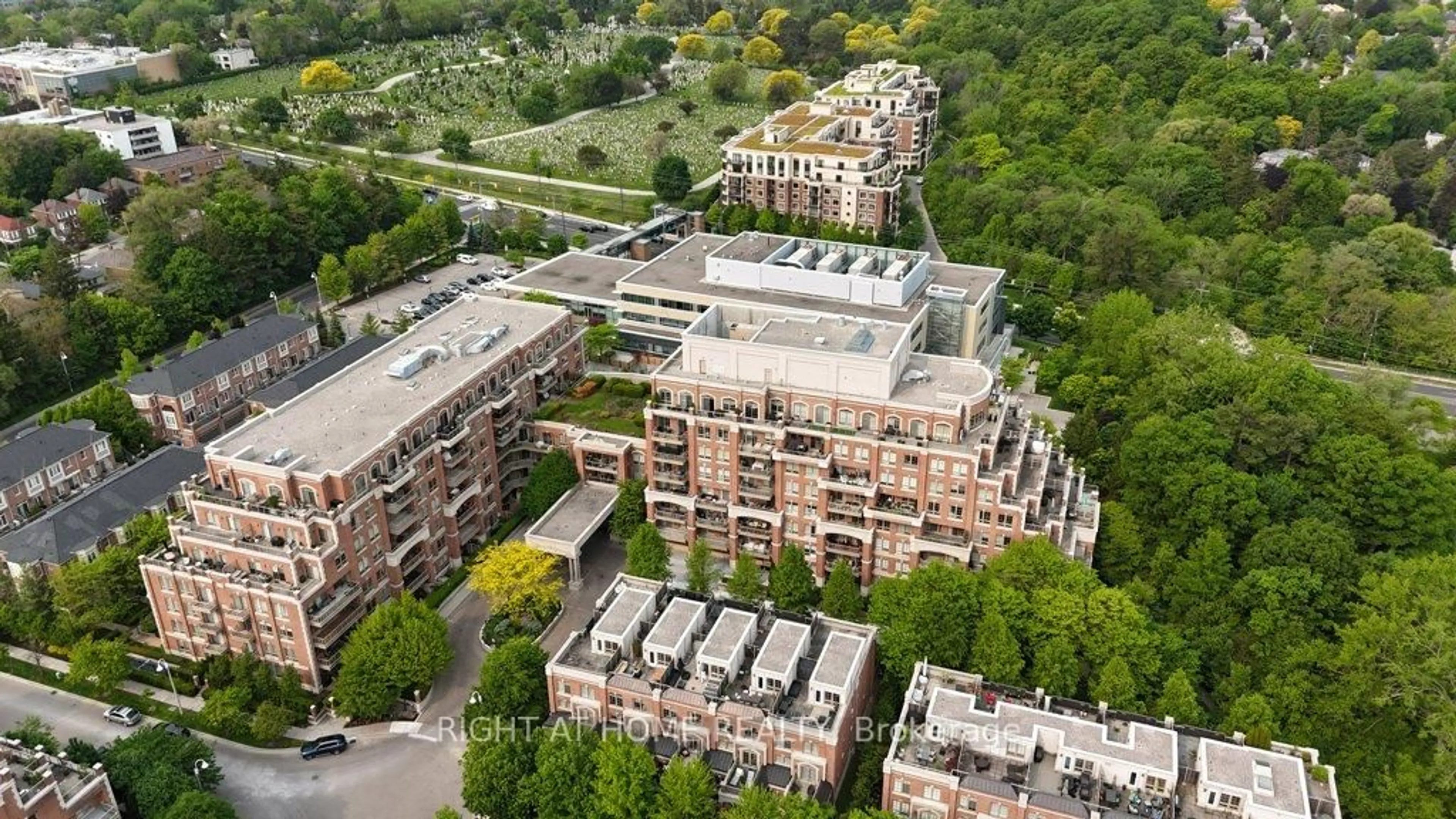 A pic from outside/outdoor area/front of a property/back of a property/a pic from drone, city buildings view from balcony for 20 Burkebrook Pl #216, Toronto Ontario M4G 0A1