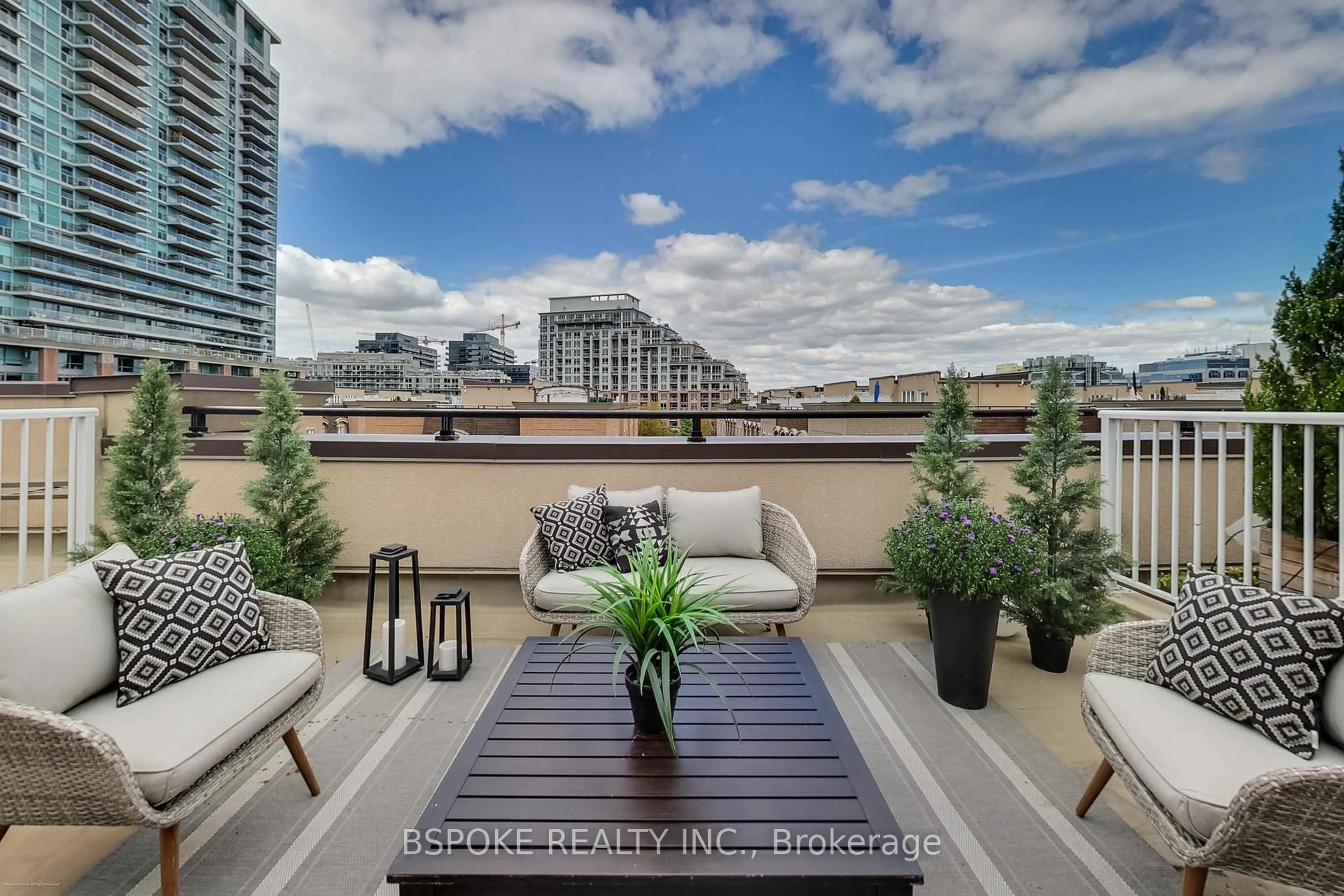 Patio, city buildings view from balcony for 54 East Liberty St #1030, Toronto Ontario M6K 3P3