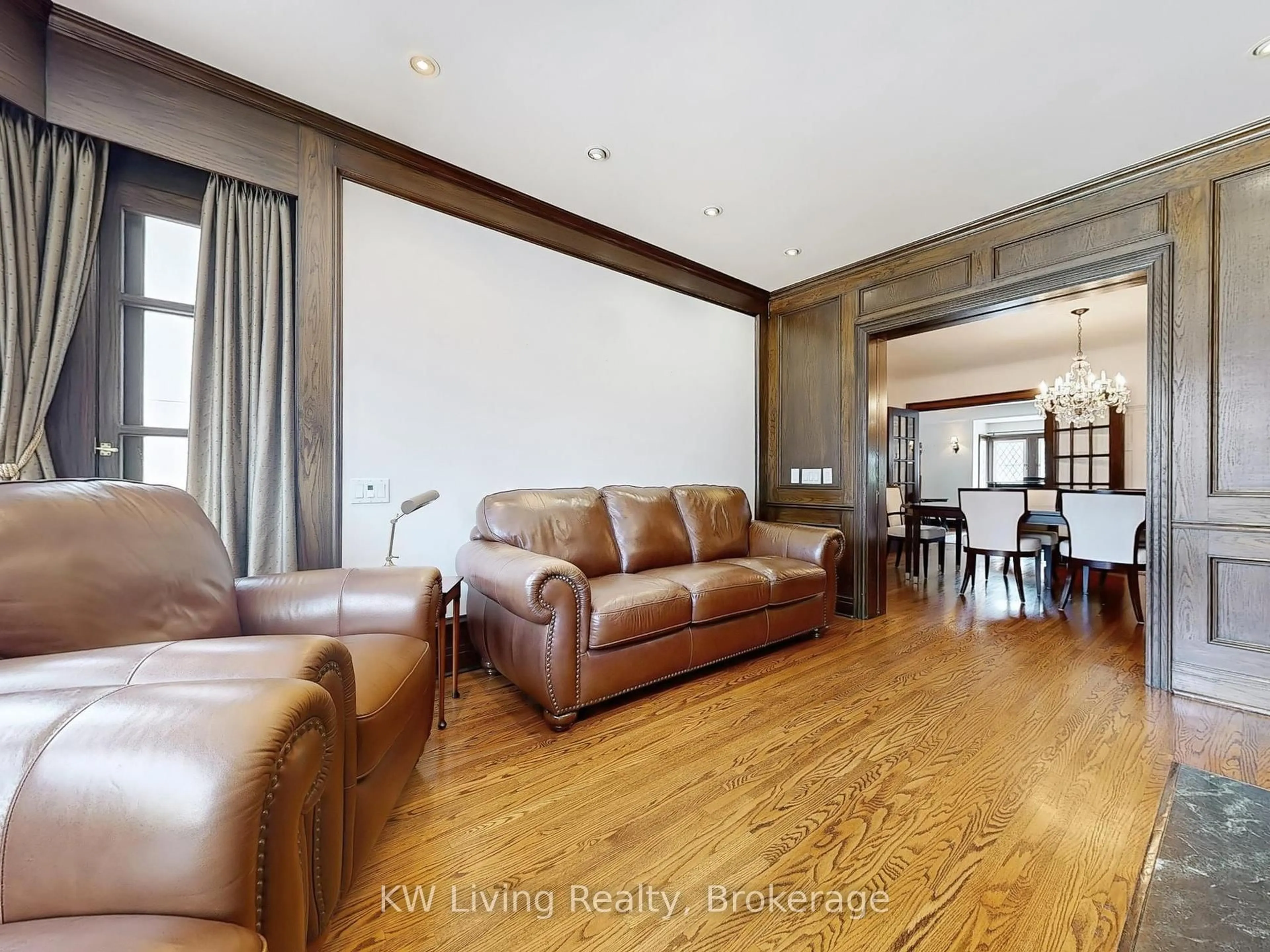 Living room with furniture, wood/laminate floor for 26 Wilberton Rd, Toronto Ontario M4V 1Z3