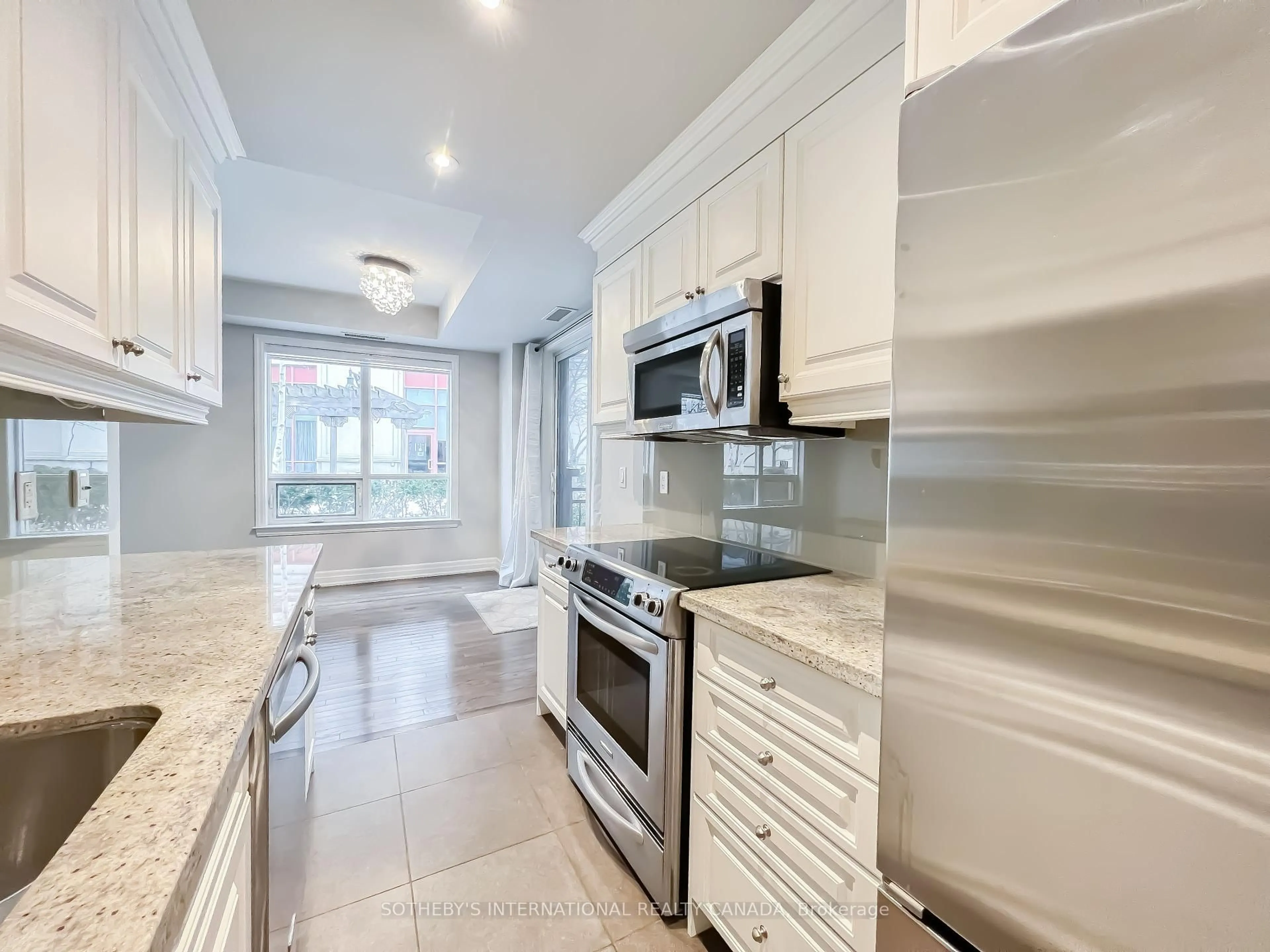 Open concept kitchen, ceramic/tile floor for 15 Rean Dr #102, Toronto Ontario M2K 0A7