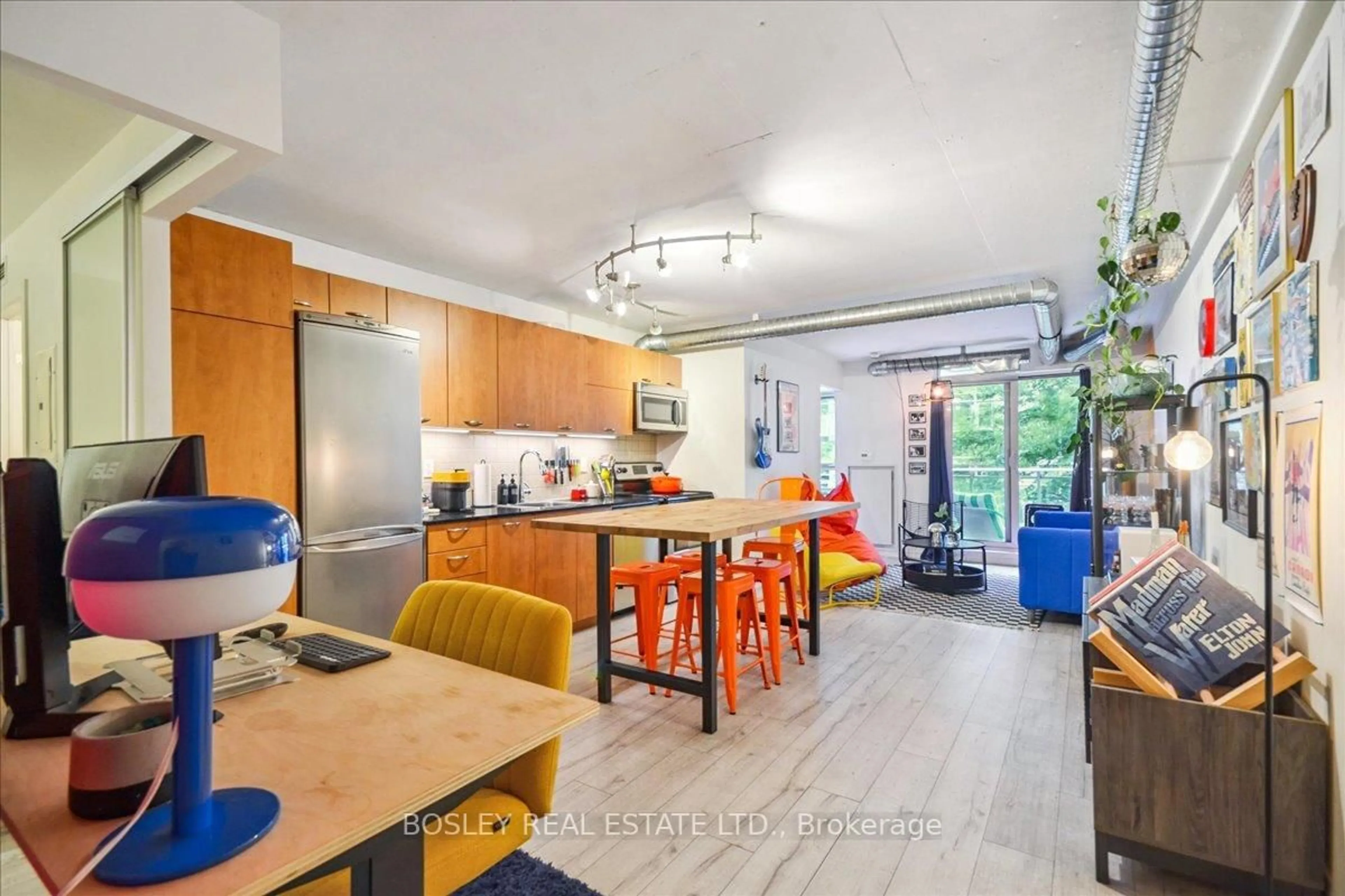 Open concept kitchen, wood/laminate floor for 170 Sudbury St #311, Toronto Ontario M6J 0A1