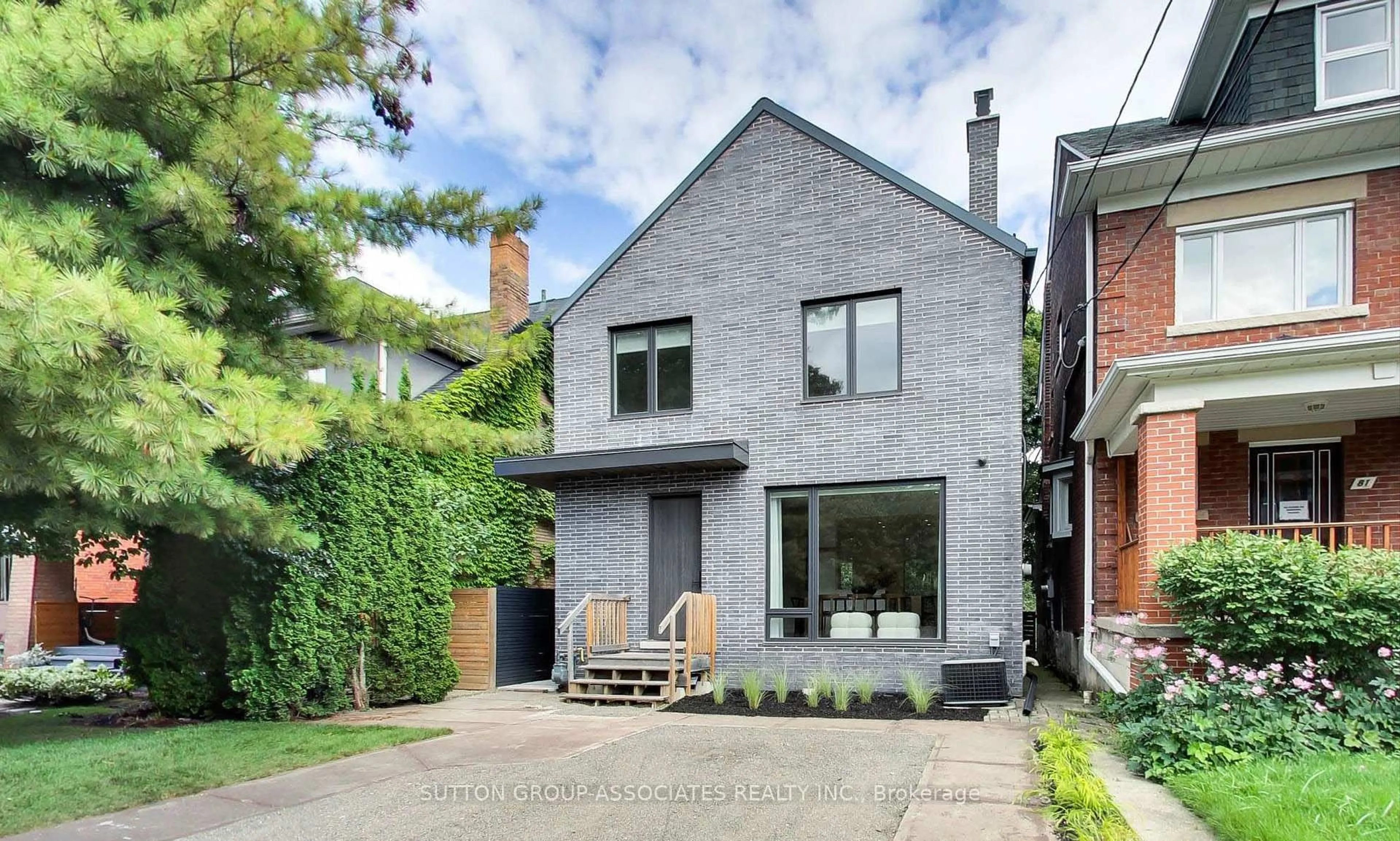 Home with brick exterior material, street for 83 Pinewood Ave, Toronto Ontario M6C 2V2