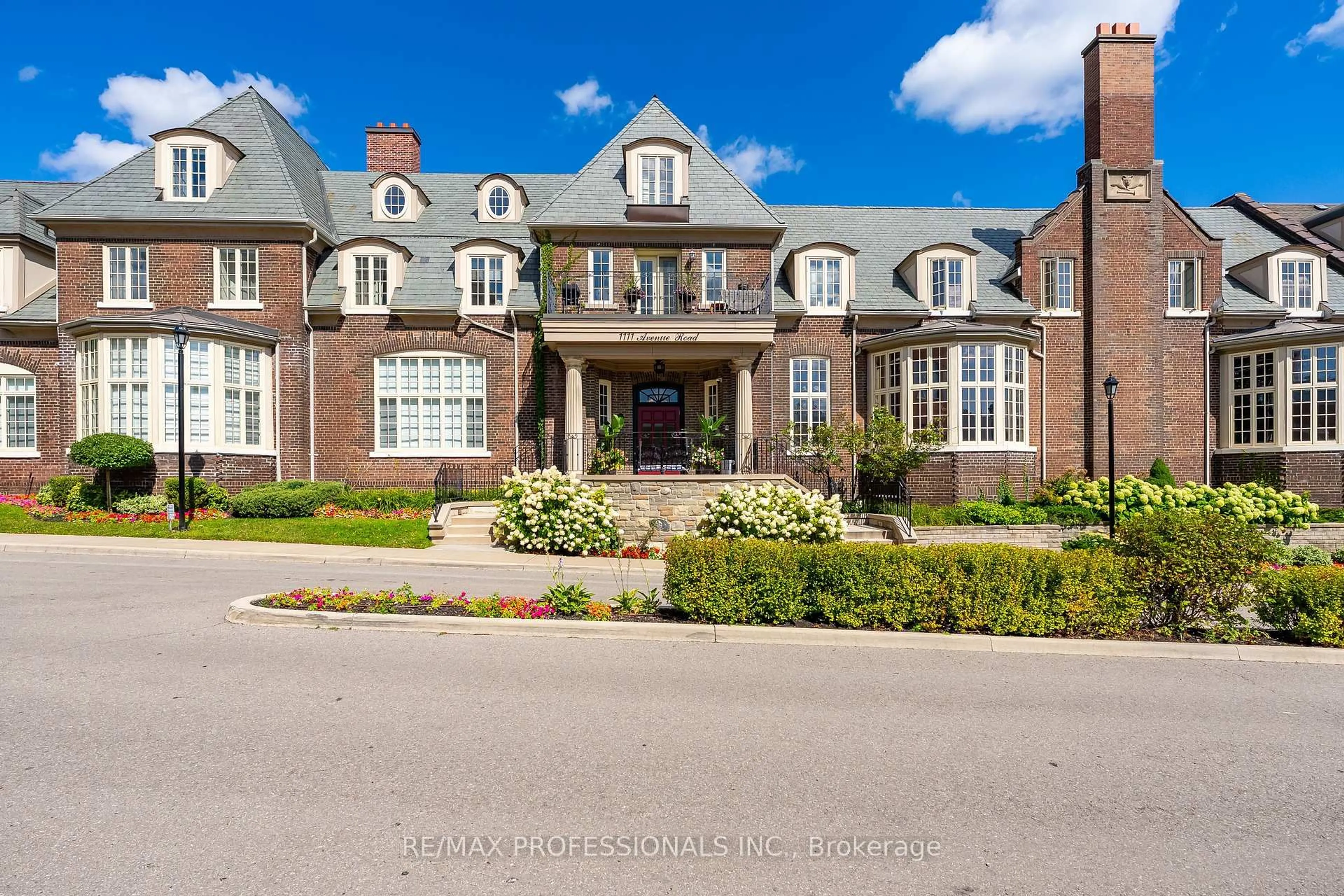 Home with brick exterior material, street for 1111 Avenue Rd #205, Toronto Ontario M5N 3B2