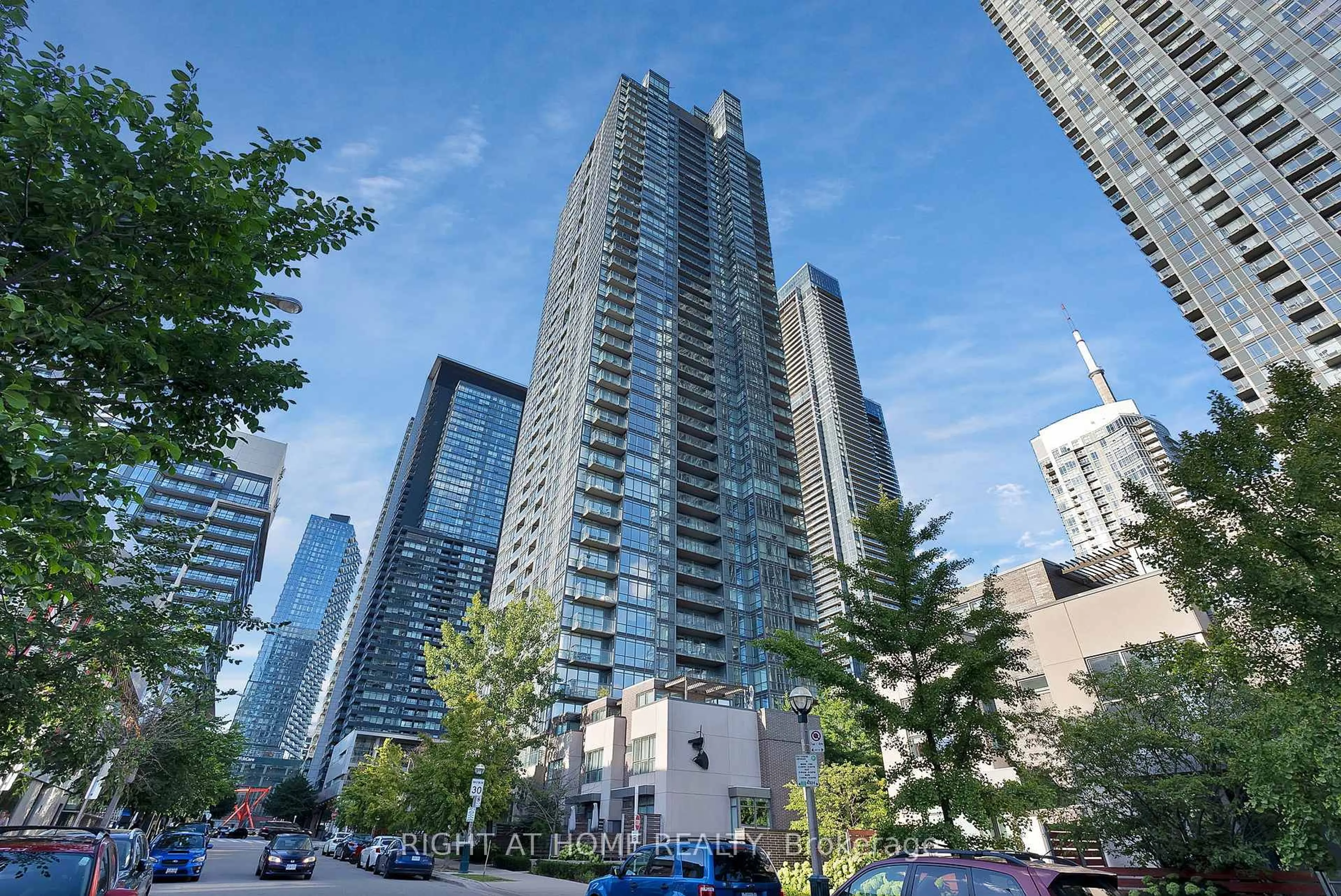 Patio, city buildings view from balcony for 15 Fort York Blvd #3205, Toronto Ontario M5V 3Y4