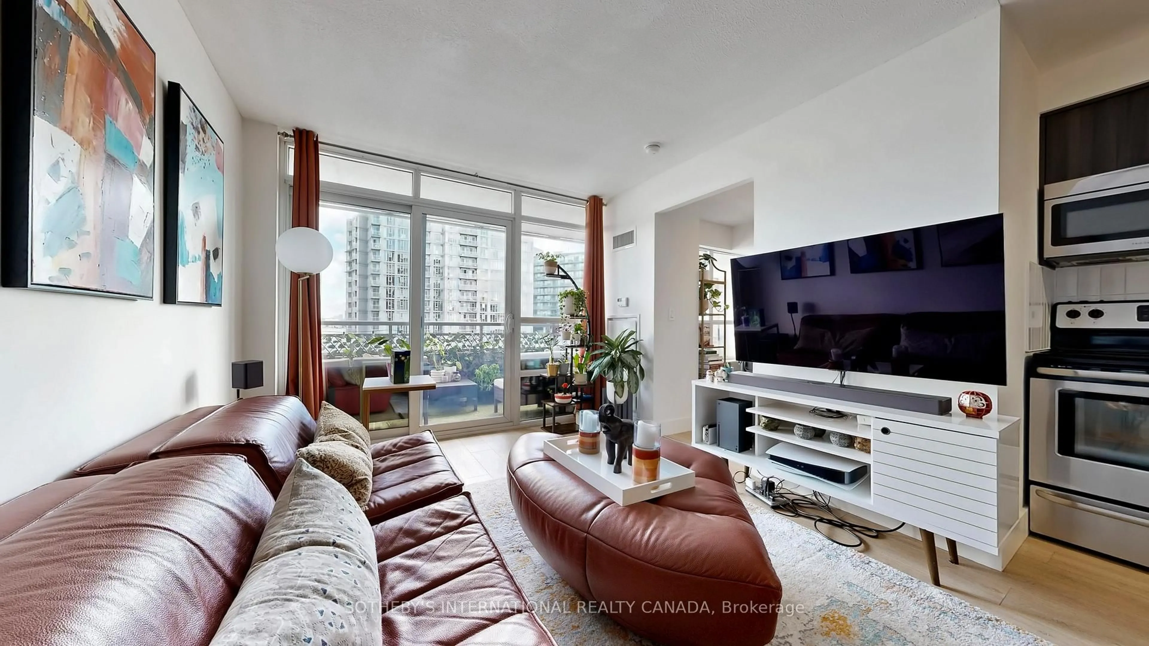 Living room with furniture, unknown for 38 Joe Shuster Way #1123, Toronto Ontario M6K 0A5
