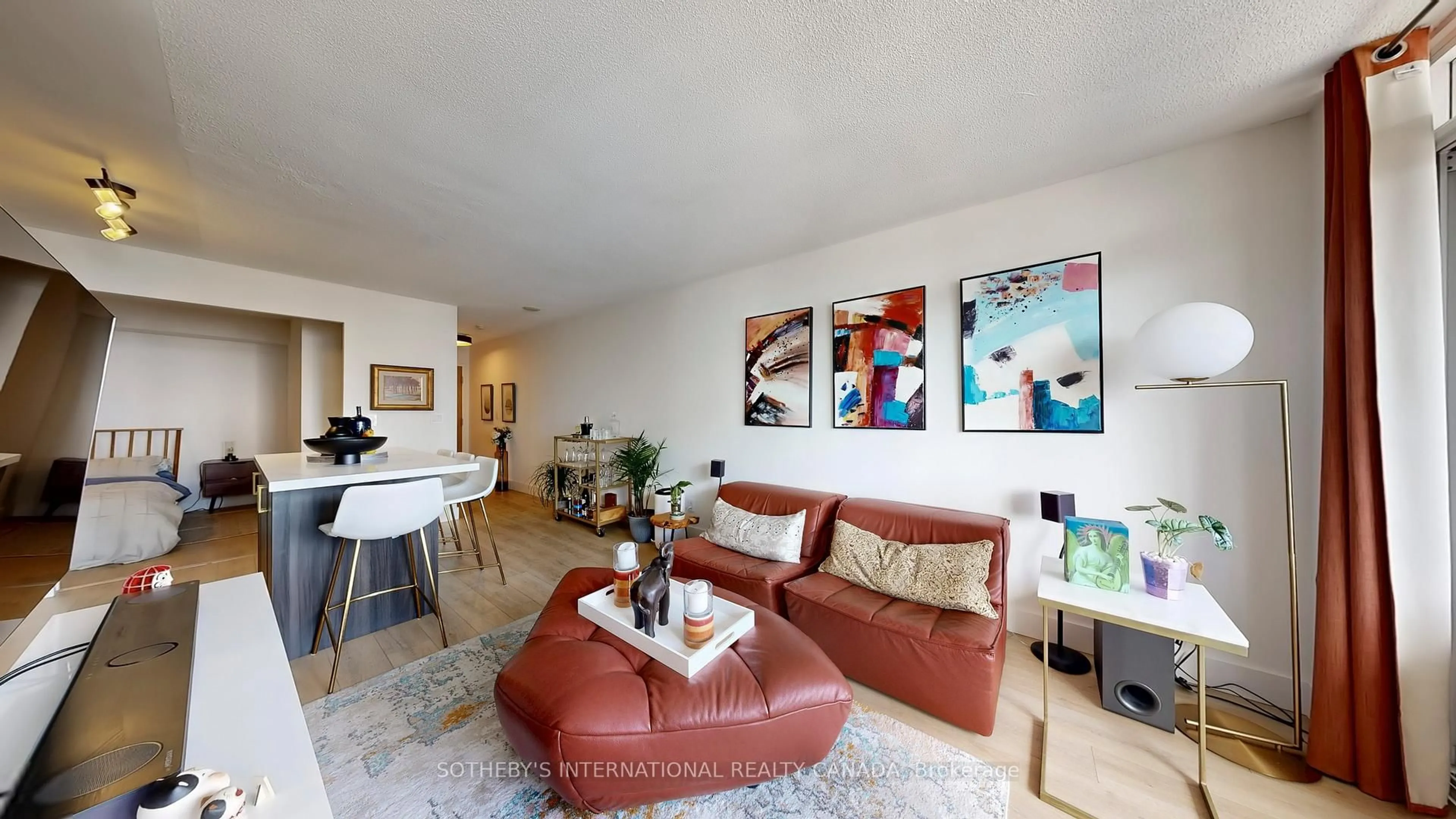 Living room with furniture, unknown for 38 Joe Shuster Way #1123, Toronto Ontario M6K 0A5
