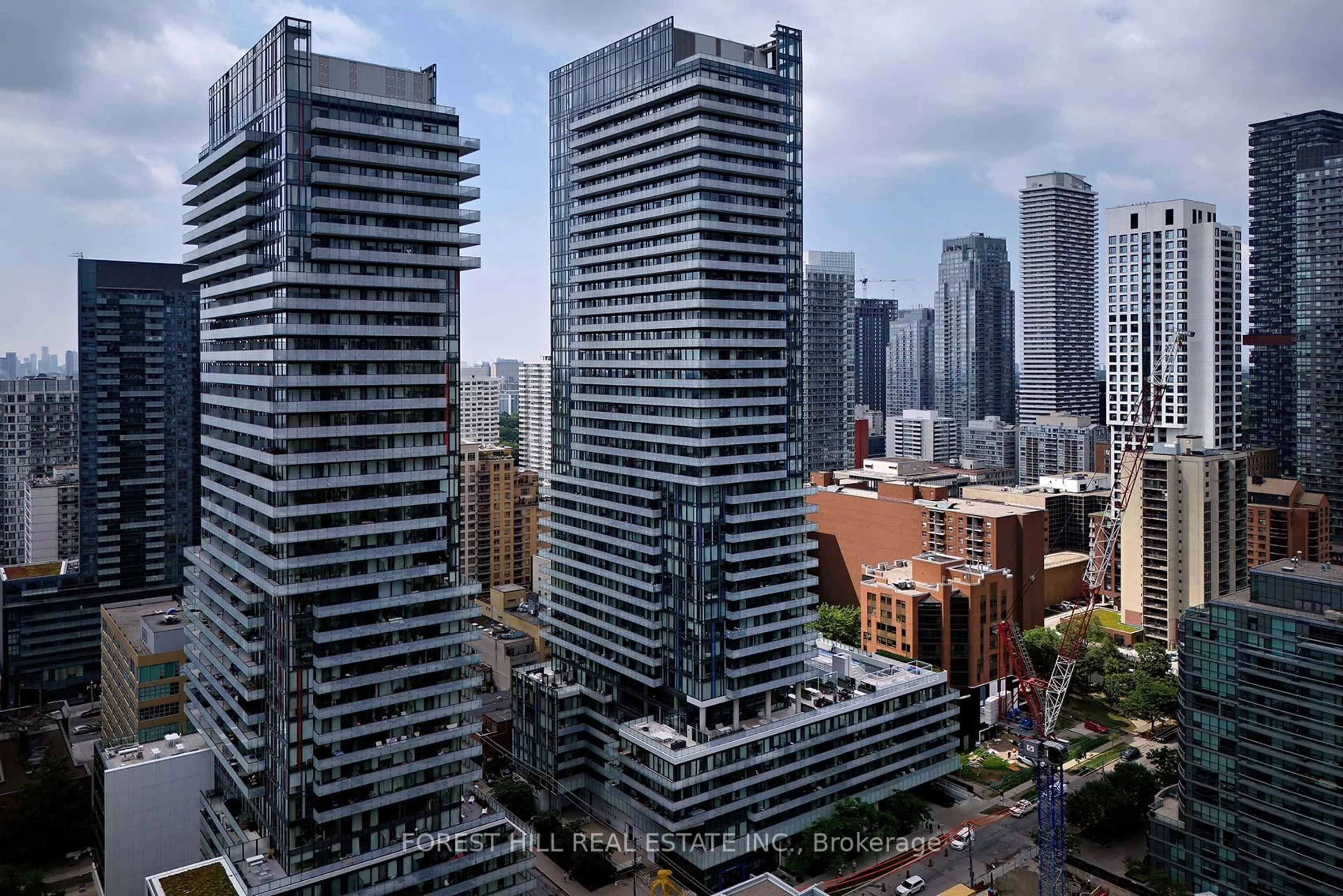 A pic from outside/outdoor area/front of a property/back of a property/a pic from drone, city buildings view from balcony for 161 Roehampton Ave #711, Toronto Ontario M4P 1P9