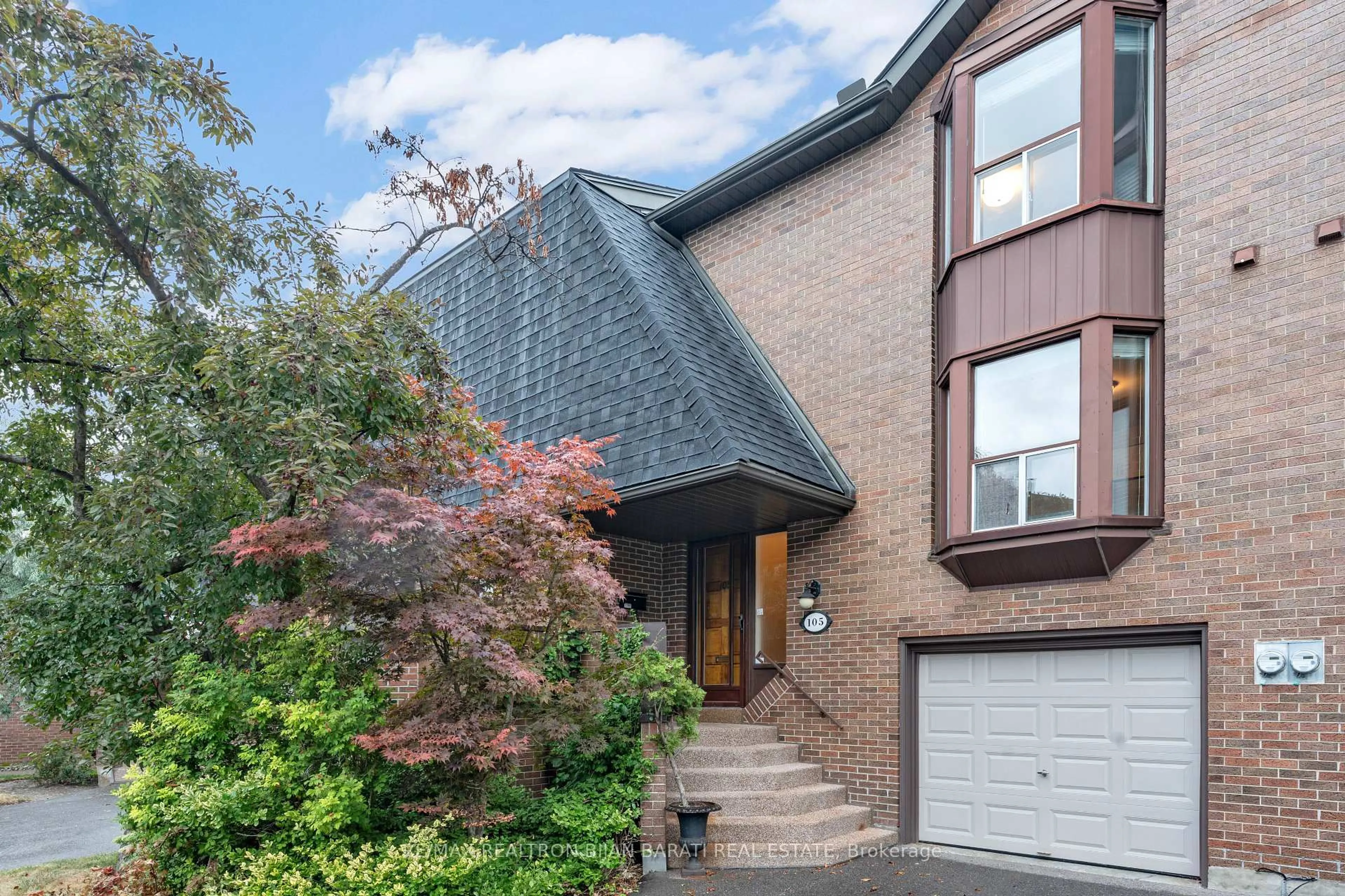 Home with brick exterior material, street for 105 Gypsy Roseway, Toronto Ontario M2N 5Z1