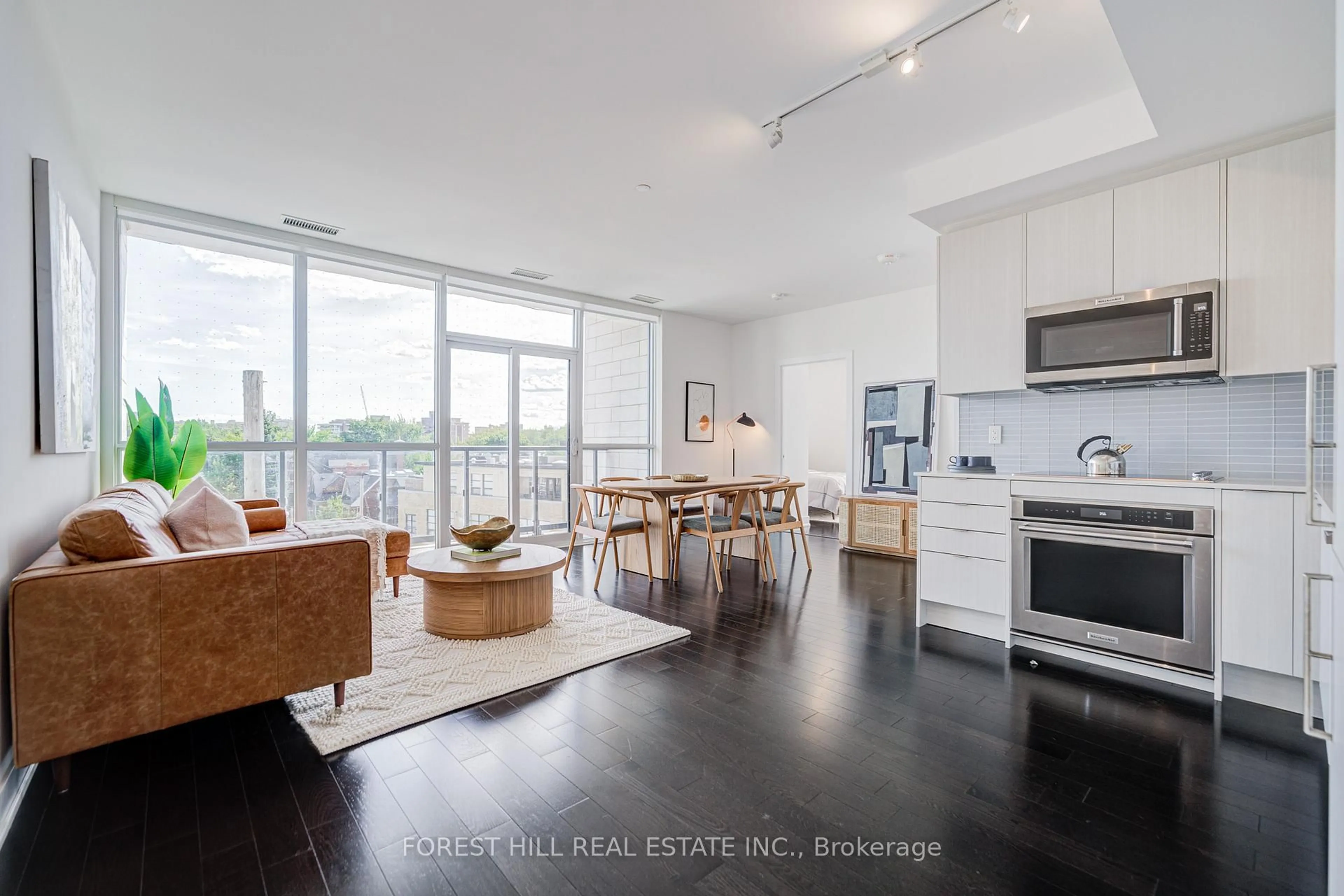 Open concept kitchen, wood/laminate floor for 181 Bedford Rd #409, Toronto Ontario M5R 0C2