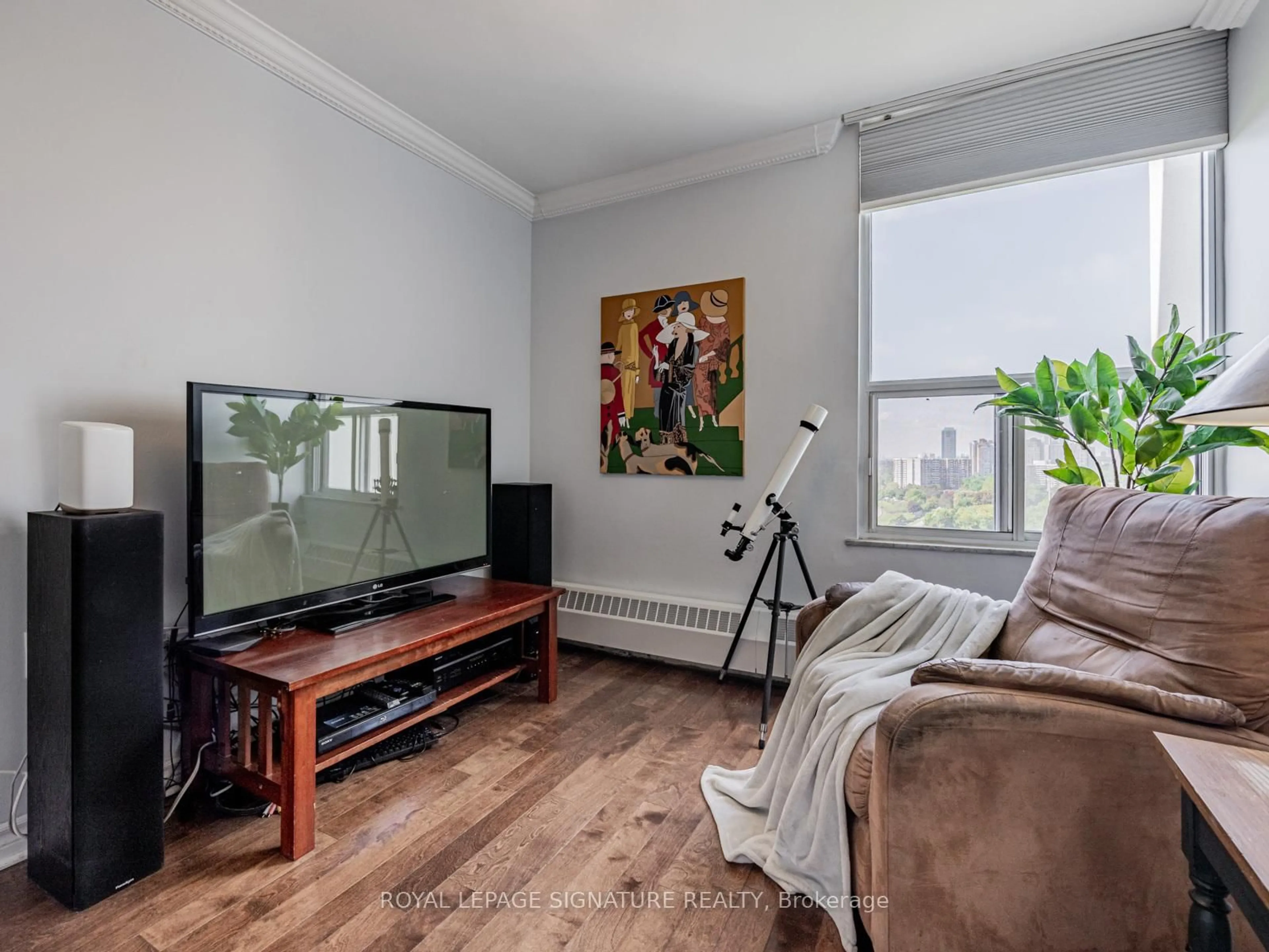 Living room with furniture, wood/laminate floor for 60 Pavane Linkway #1914, Toronto Ontario M3C 2Y6