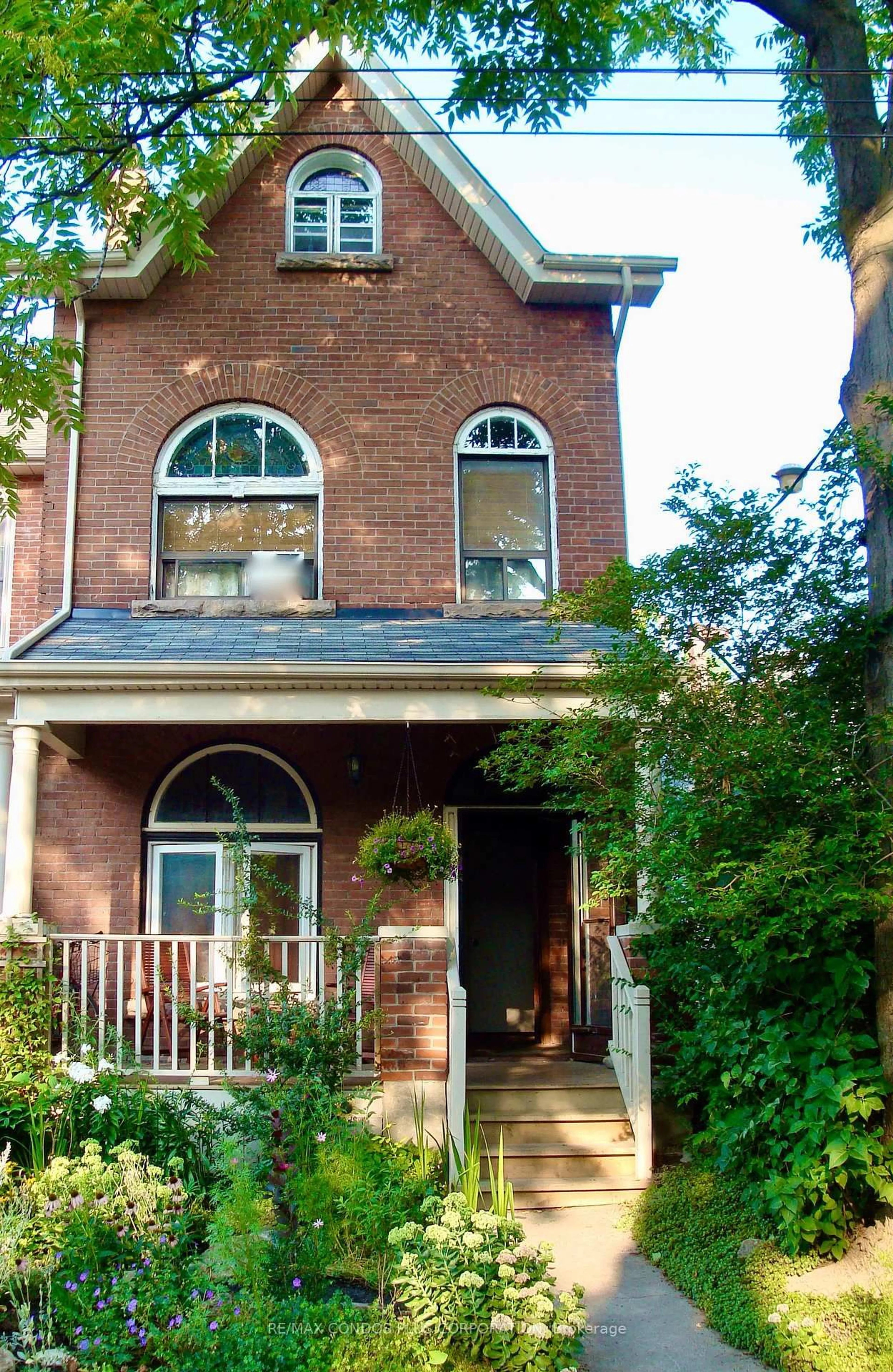 Home with brick exterior material, street for 548 Roxton Rd, Toronto Ontario M6G 3R4