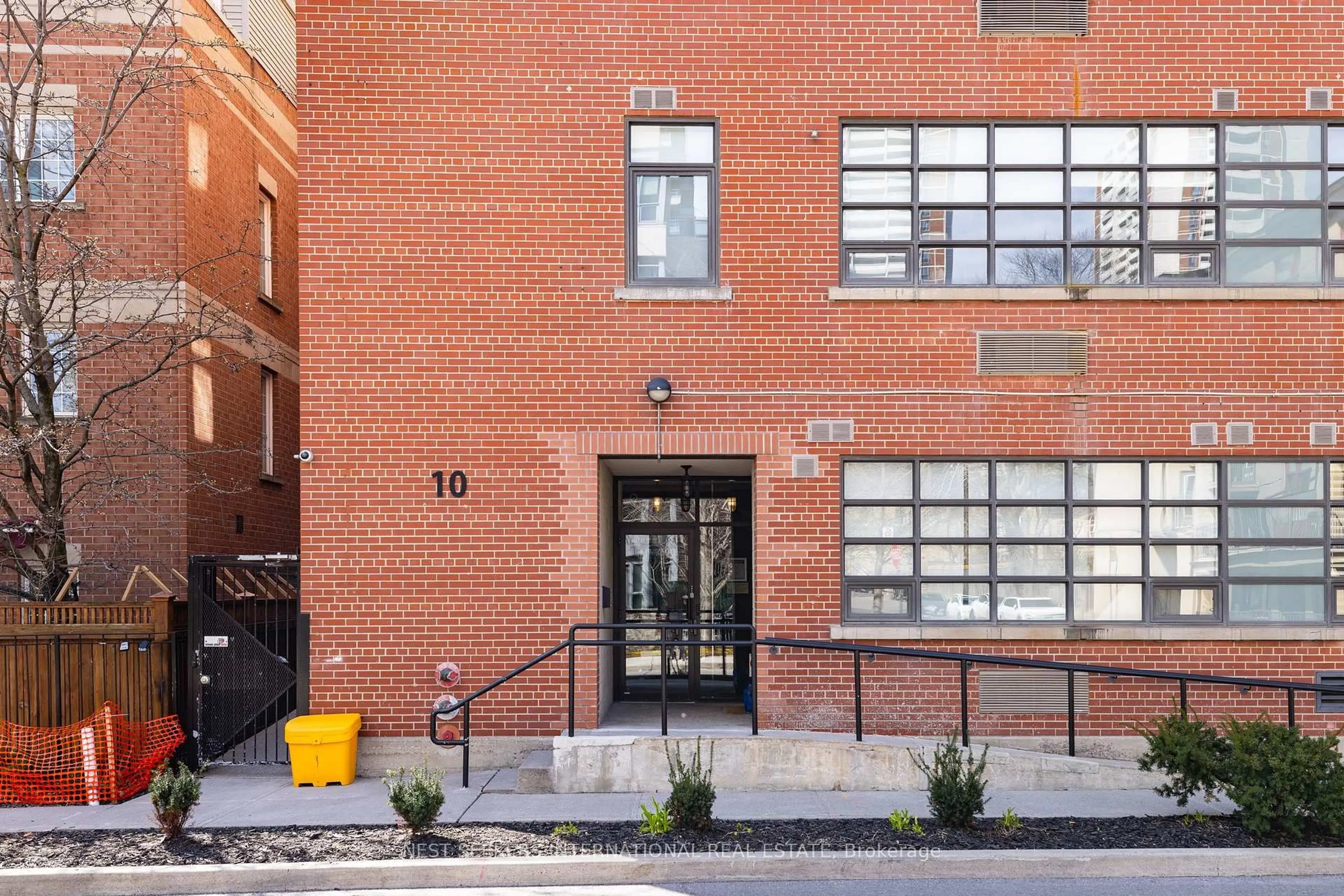 Home with brick exterior material, building for 10 Wellesley Pl #302, Toronto Ontario M4Y 1B1