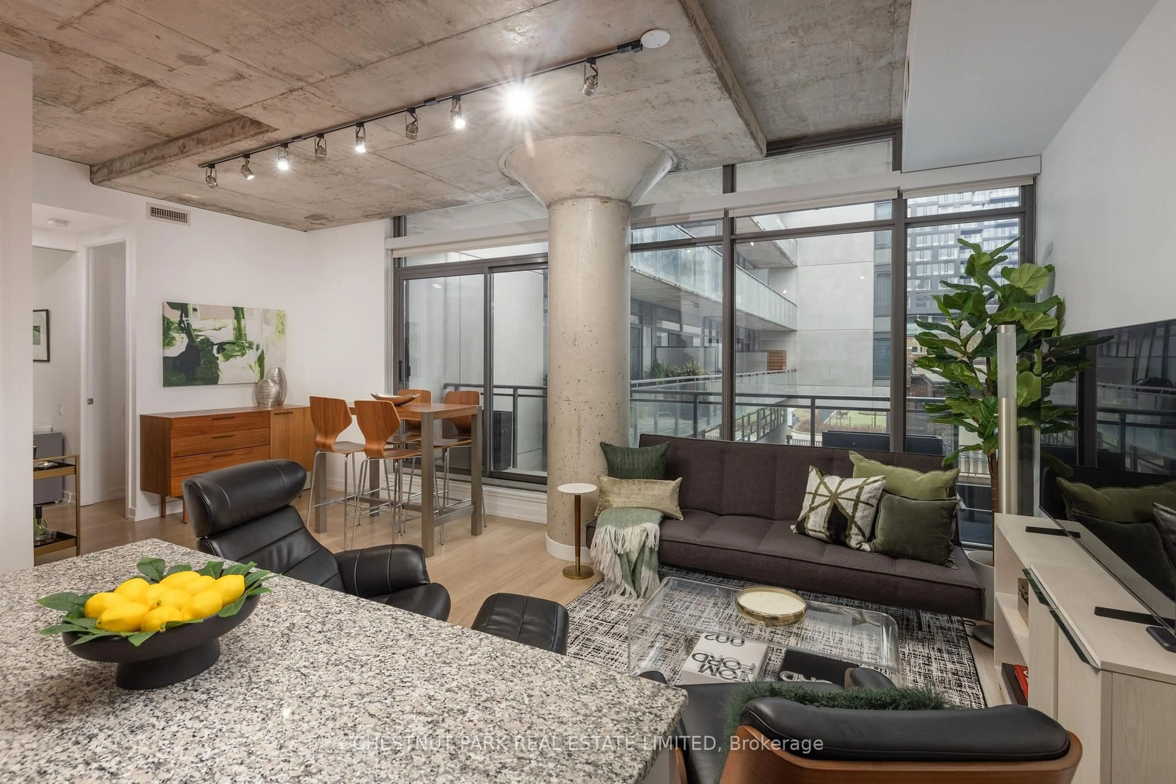 Living room with furniture, cement floor for 10 Morrison St #301, Toronto Ontario M5V 2T8