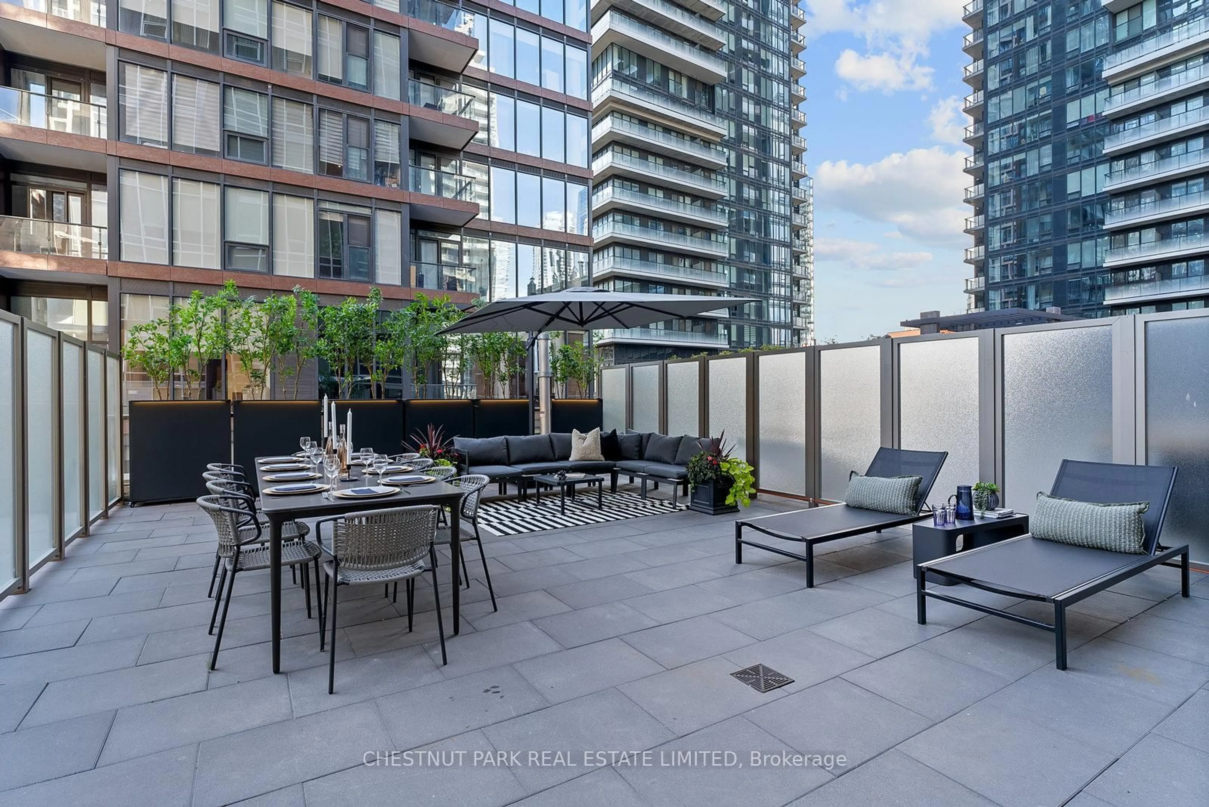 Patio, city buildings view from balcony for 15 Mercer St #610, Toronto Ontario M5V 1H2