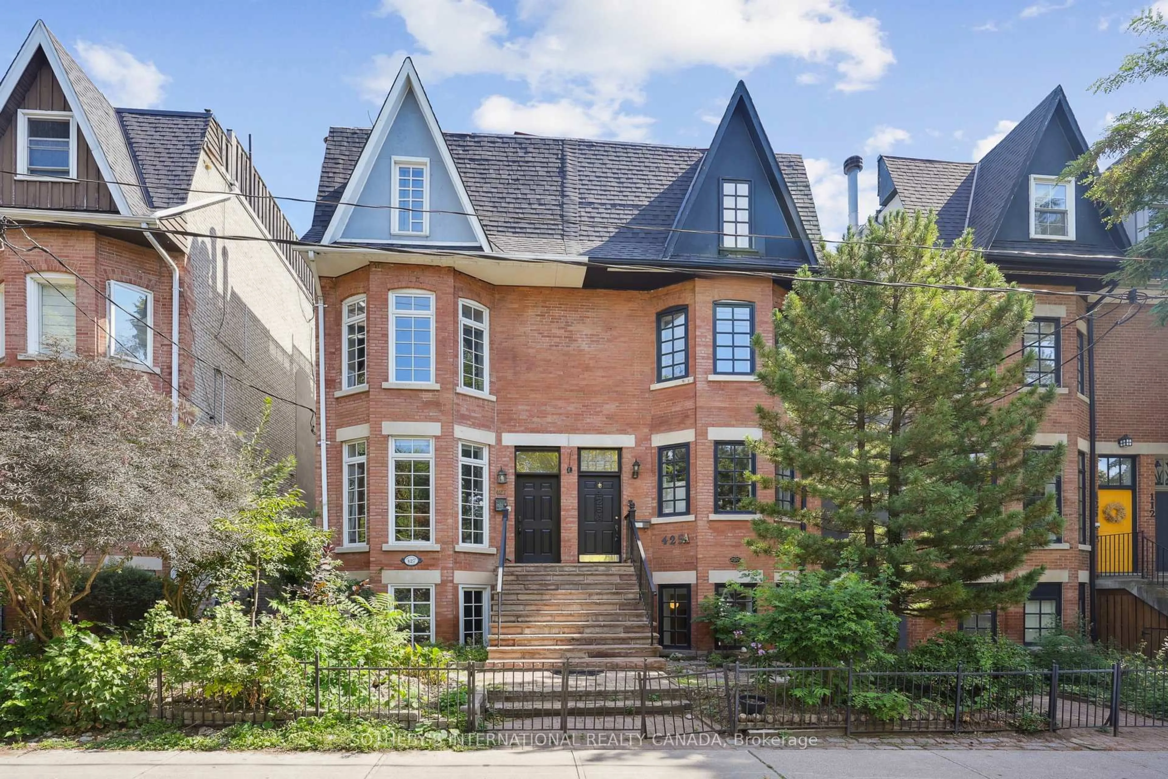 Home with brick exterior material, street for 425A Sackville St, Toronto Ontario M4X 1T1