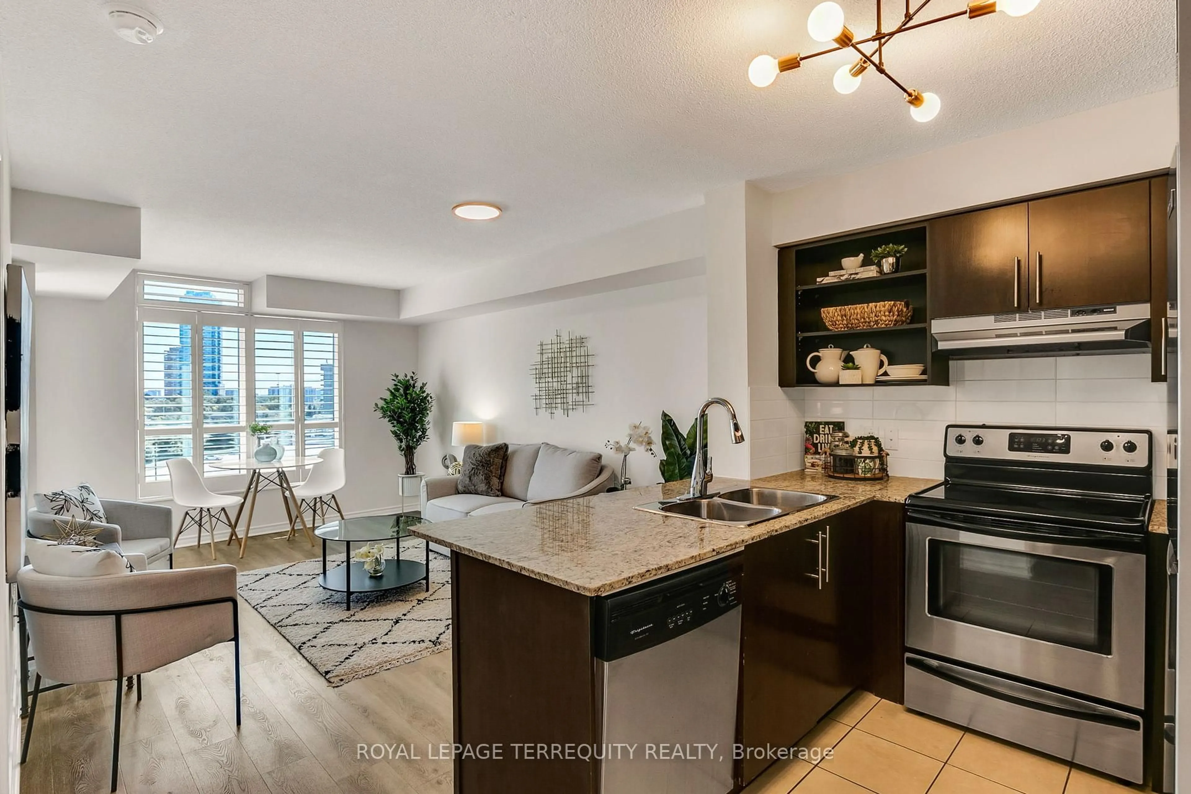 Open concept kitchen, ceramic/tile floor for 120 Dallimore Circ #515, Toronto Ontario M3C 4J1