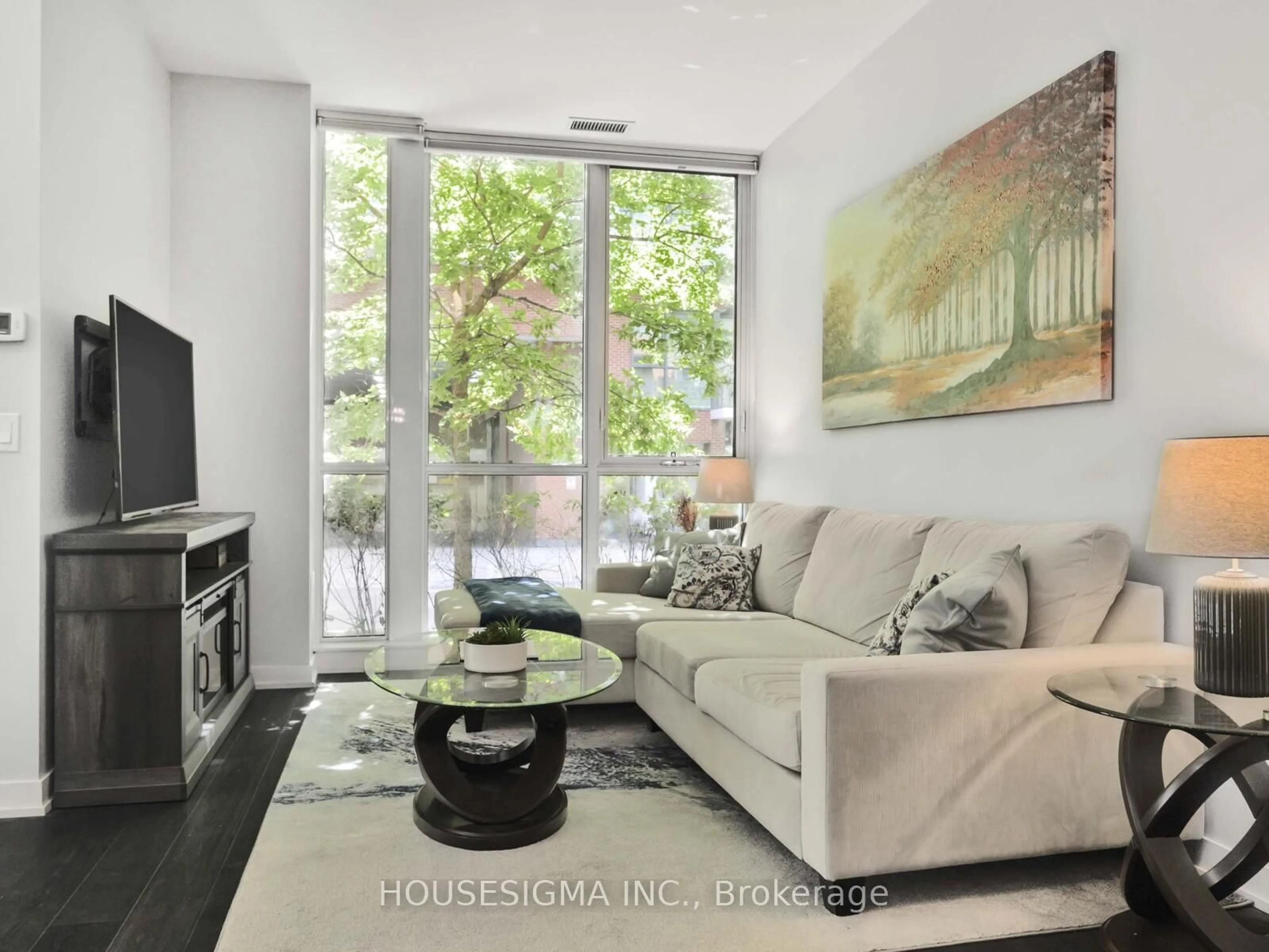 Living room with furniture, unknown for 32 Bruyers Mews #TH03, Toronto Ontario M5V 0H8