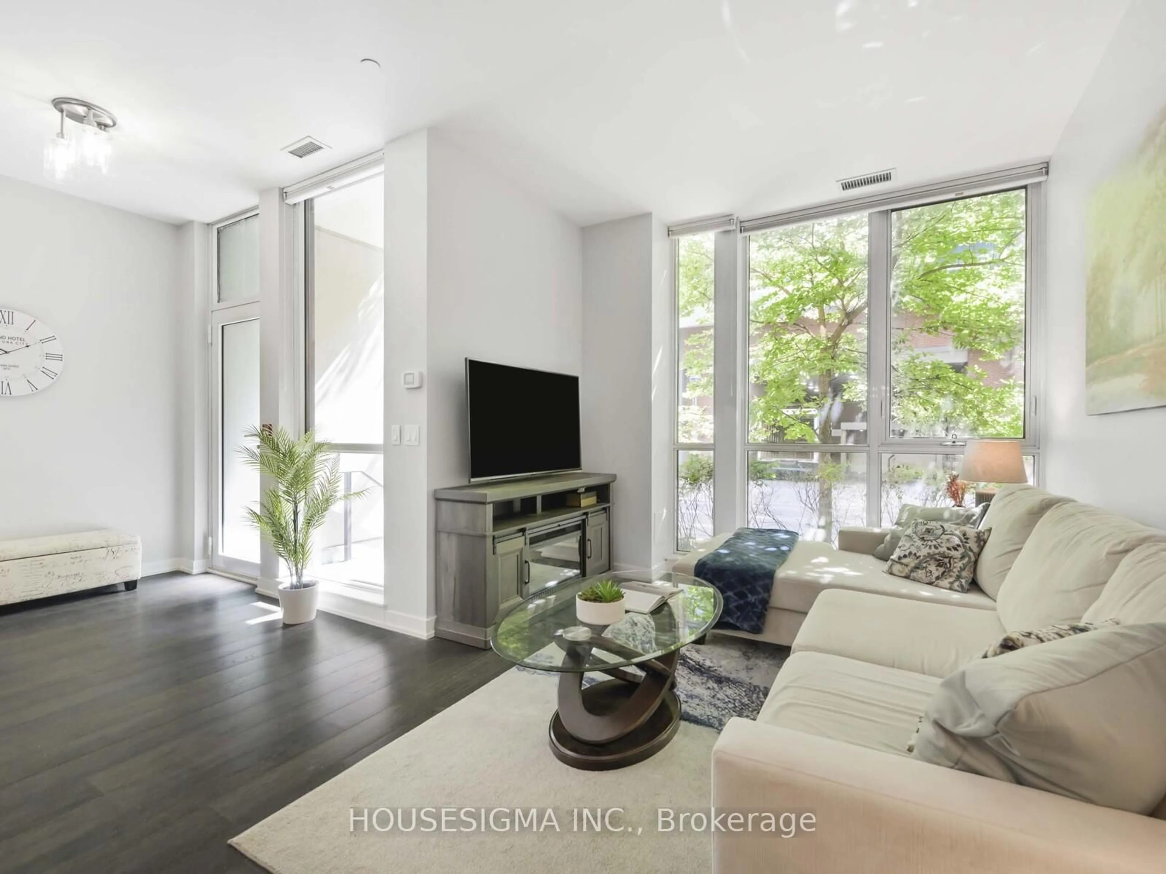 Living room with furniture, unknown for 32 Bruyers Mews #TH03, Toronto Ontario M5V 0H8