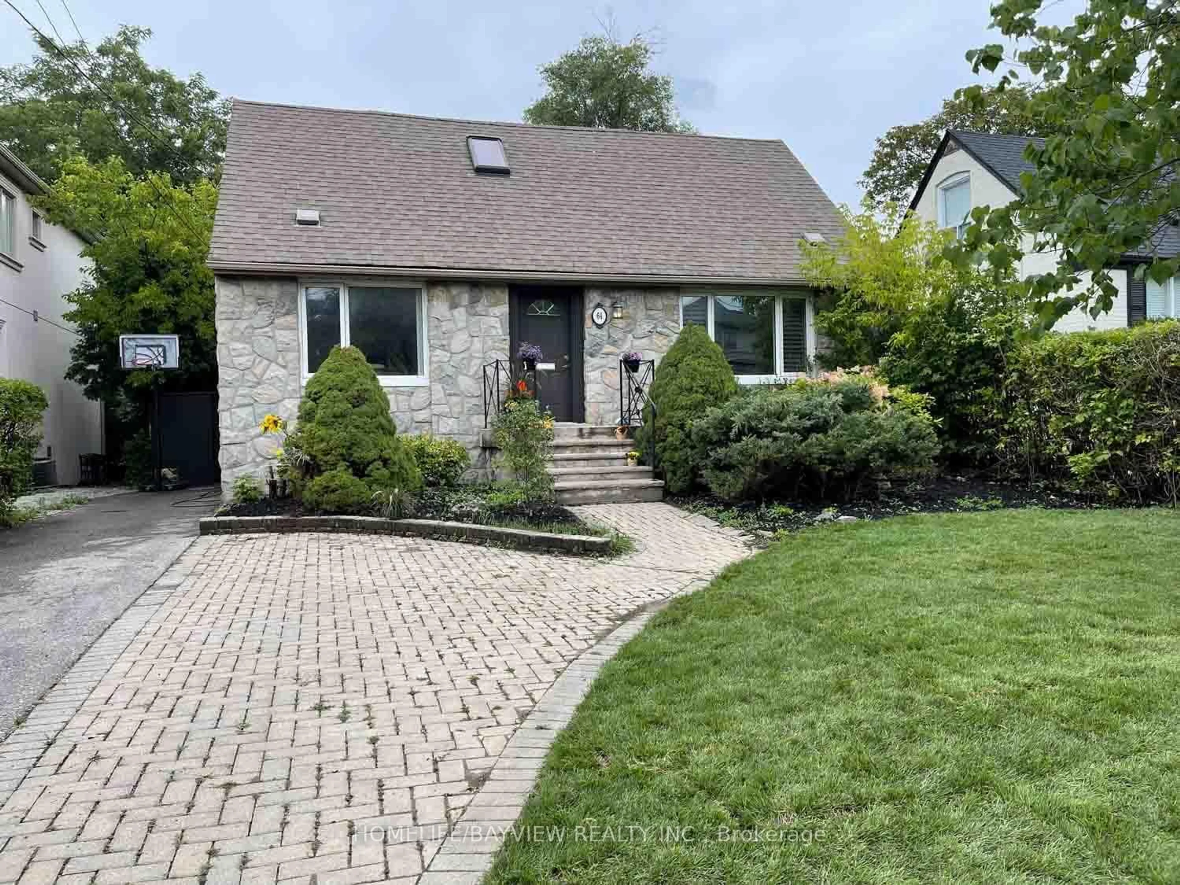 Home with brick exterior material, street for 64 Ridgevale Dr, Toronto Ontario M6A 1L1