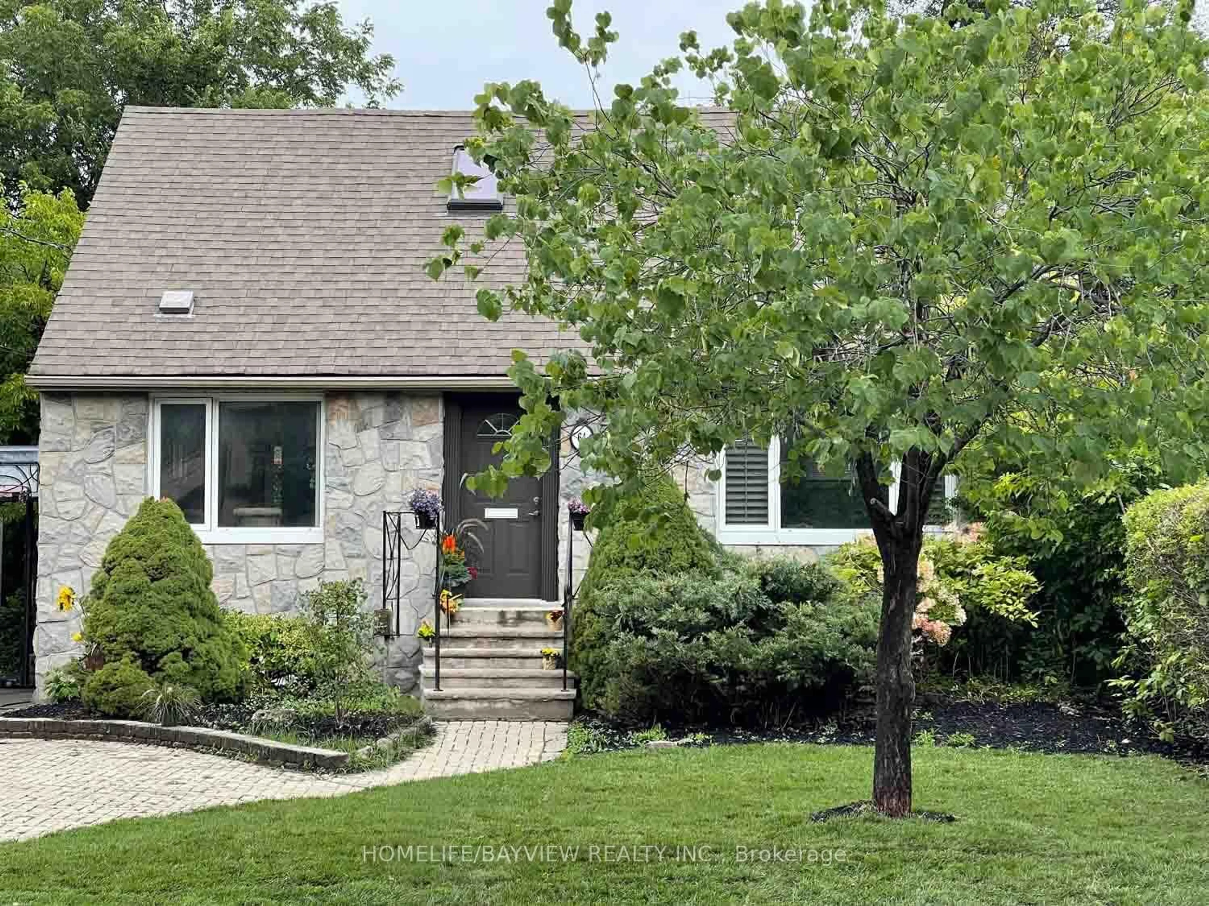 Home with brick exterior material, street for 64 Ridgevale Dr, Toronto Ontario M6A 1L1