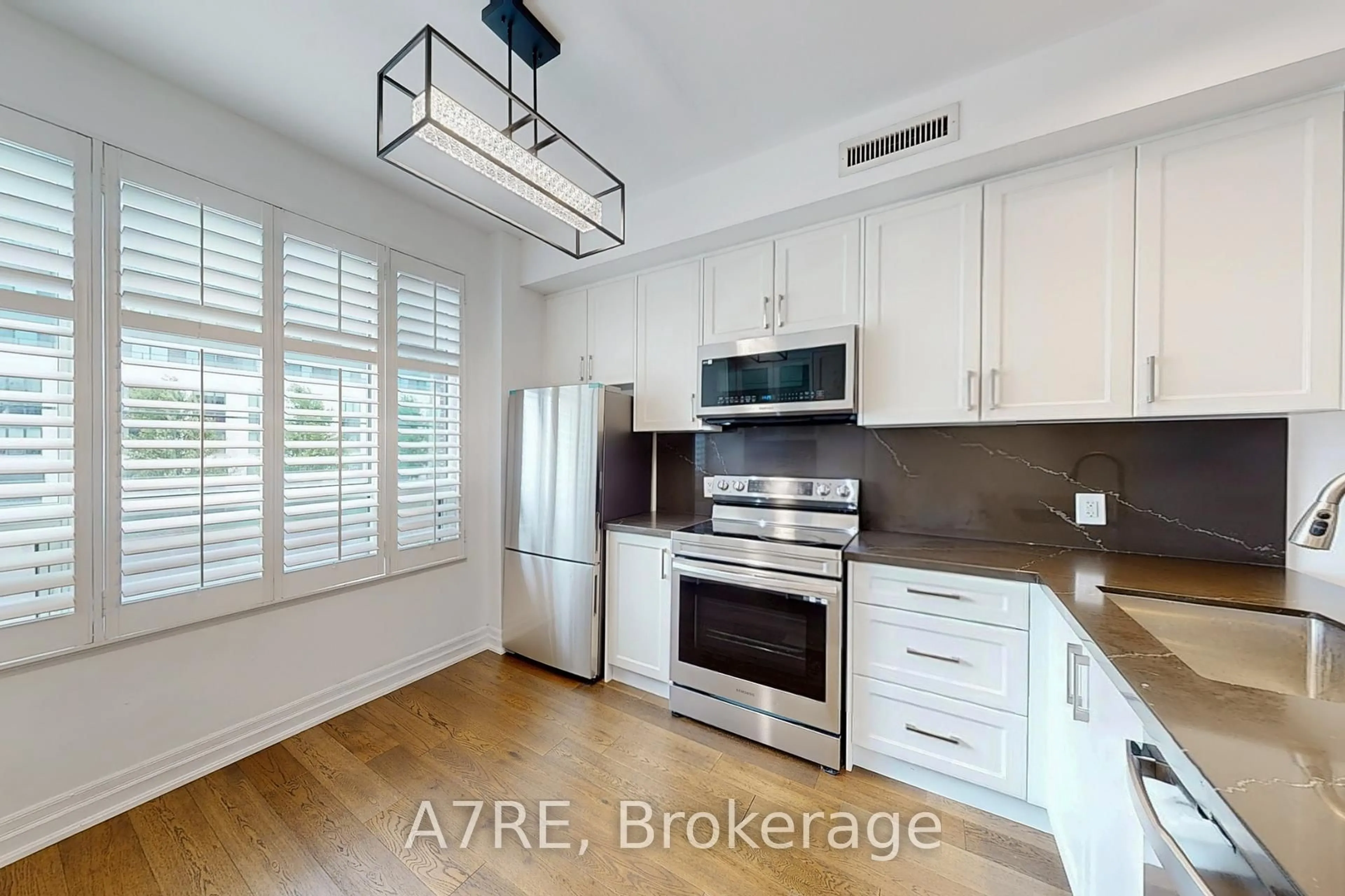 Open concept kitchen, unknown for 724 Sheppard Ave #203, Toronto Ontario M3H 2S8