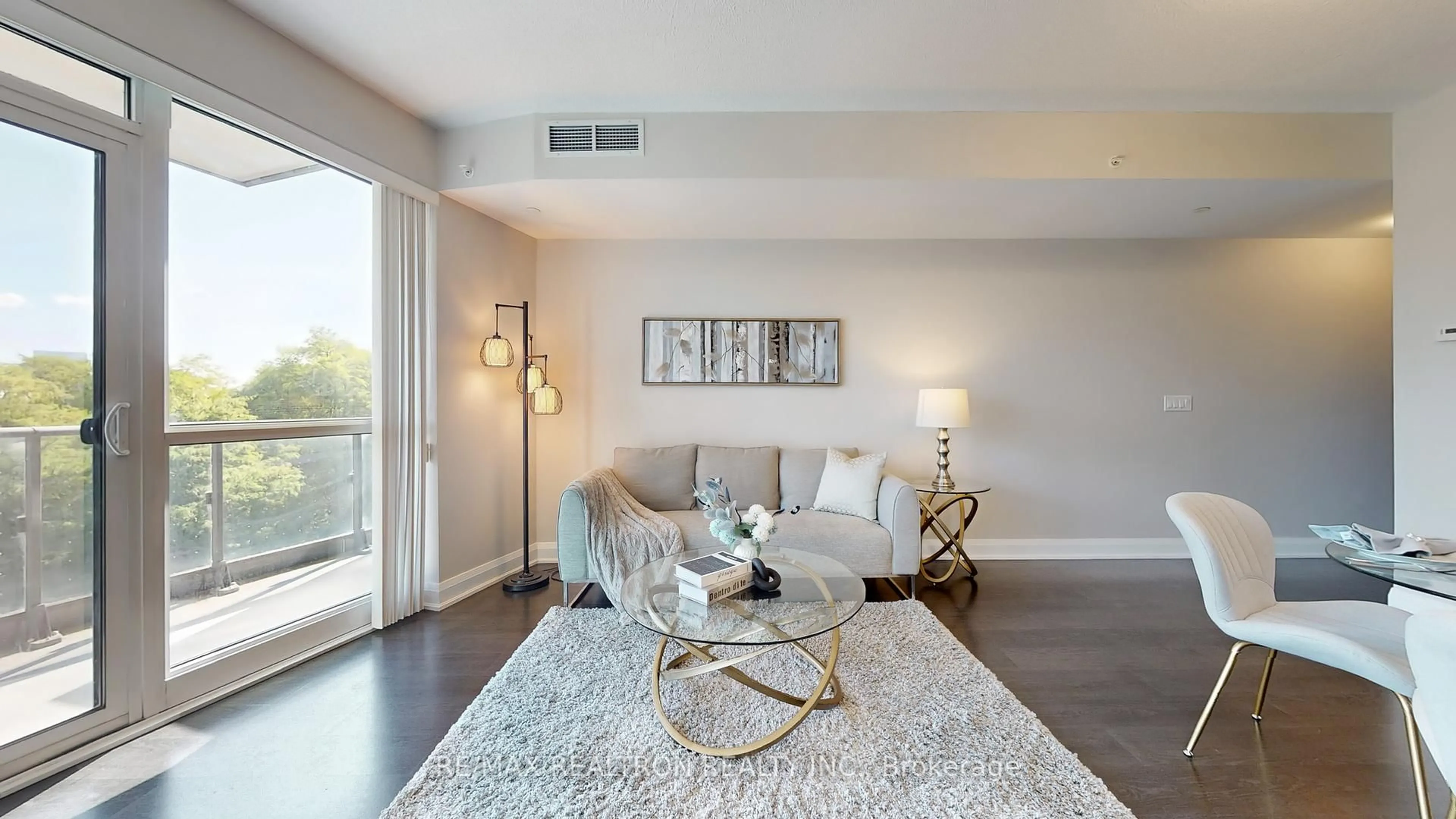 Living room with furniture, wood/laminate floor for 160 Vanderhoof Ave #303, Toronto Ontario M4G 0B7