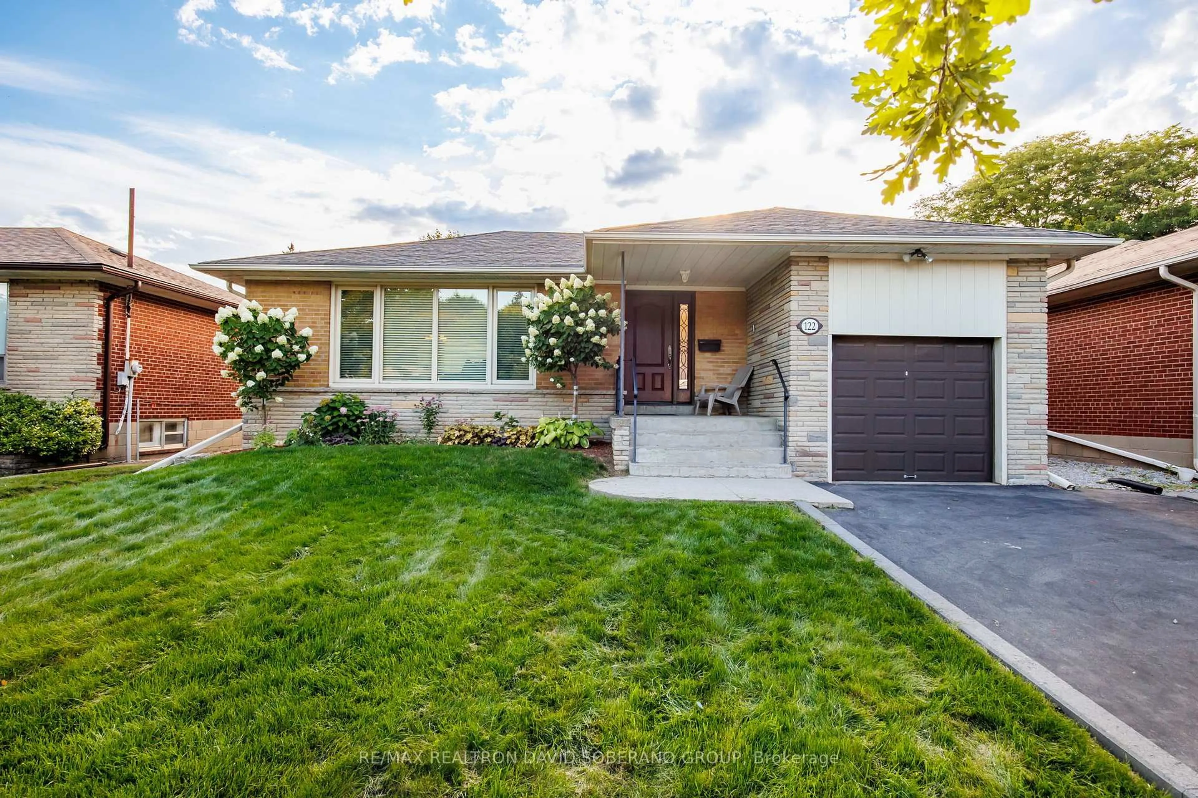 Home with brick exterior material, street for 122 Collinson Blvd, Toronto Ontario M3H 3C7