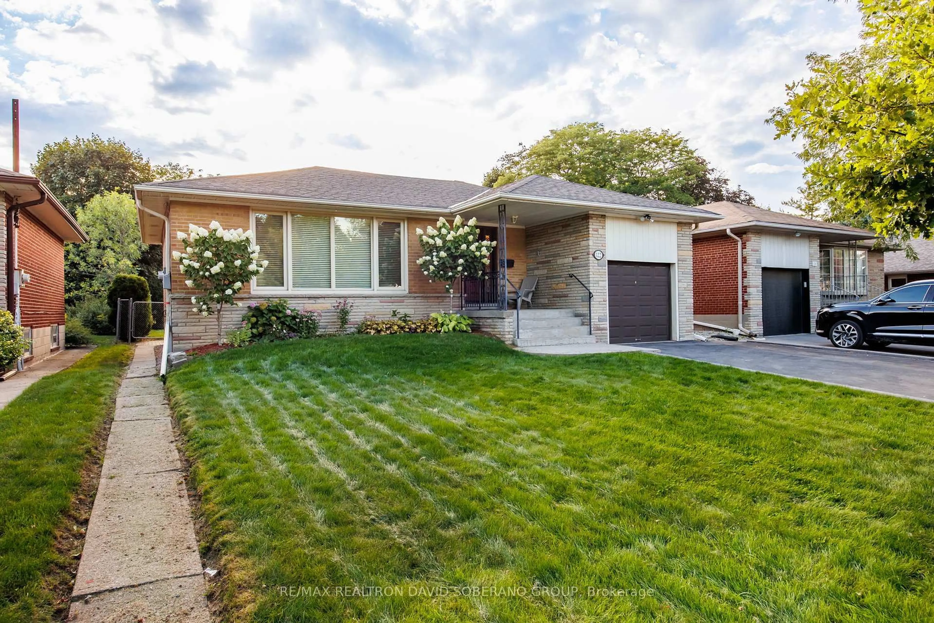 Home with brick exterior material, street for 122 Collinson Blvd, Toronto Ontario M3H 3C7