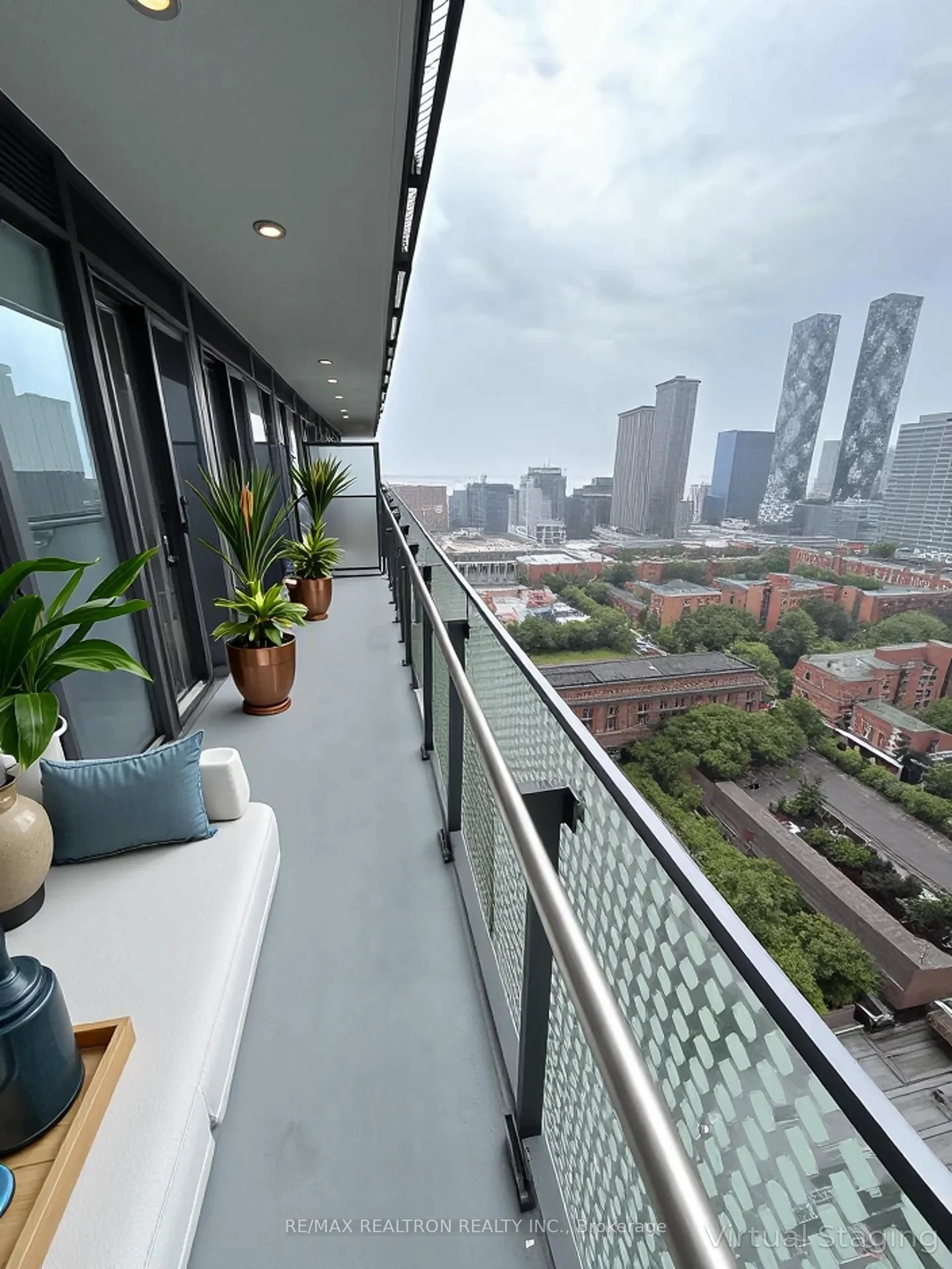 Balcony in the apartment, city buildings view from balcony for 135 Lower Sherbourne St #2433W, Toronto Ontario M5A 1Y4