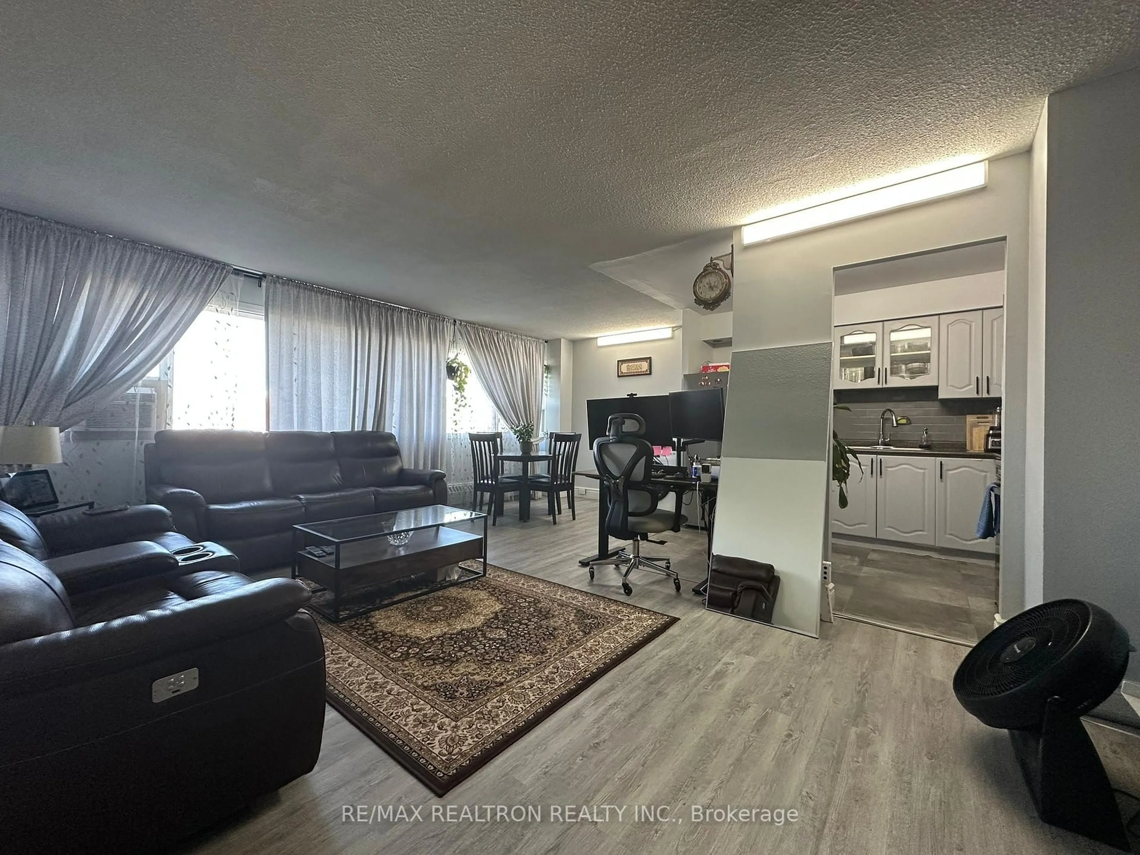 Living room with furniture, unknown for 100 Leeward Glwy #1401, Toronto Ontario M3C 2Z1