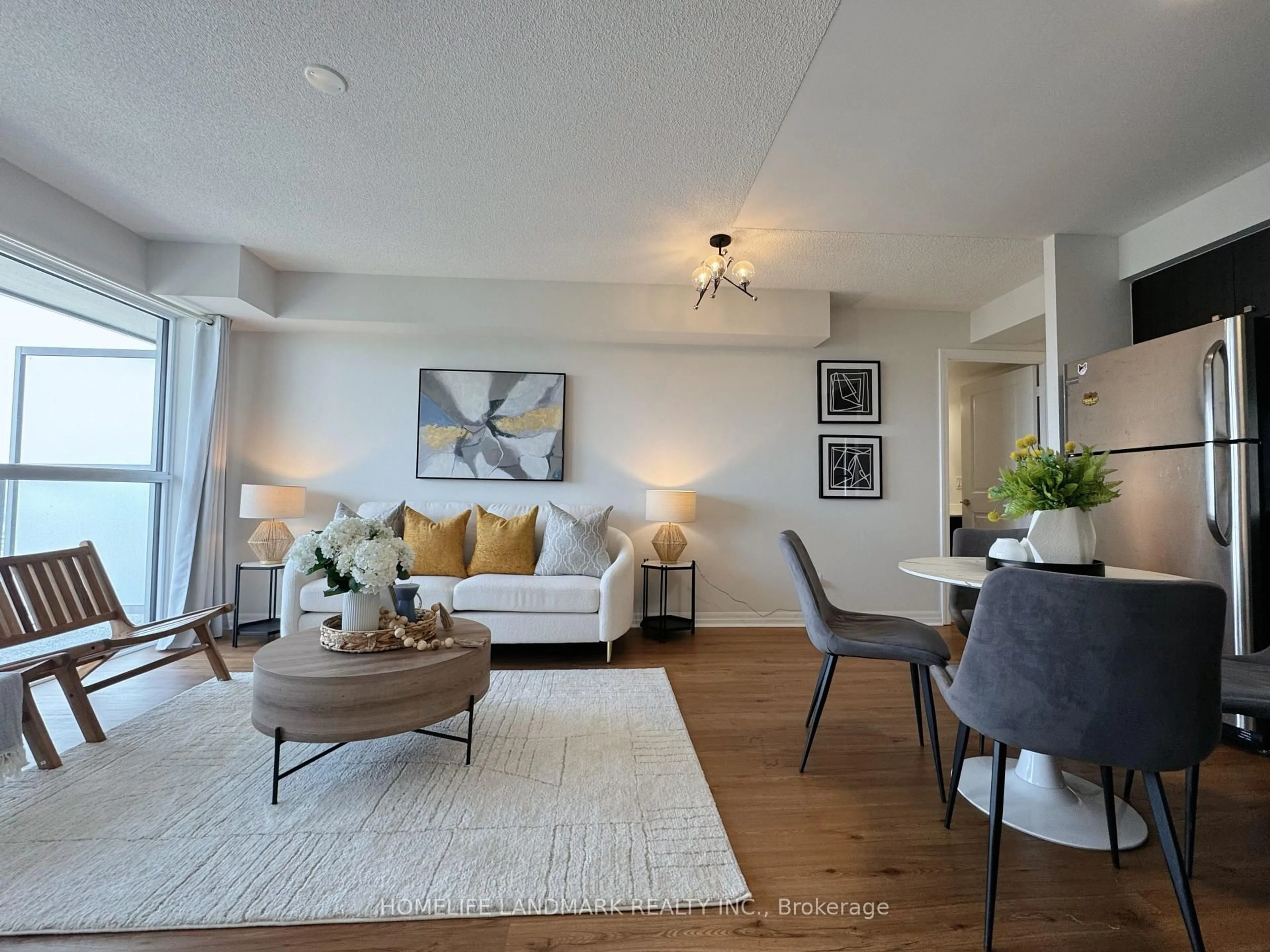 Living room with furniture, wood/laminate floor for 275 Yorkland Rd #2906, Toronto Ontario M2J 0B4