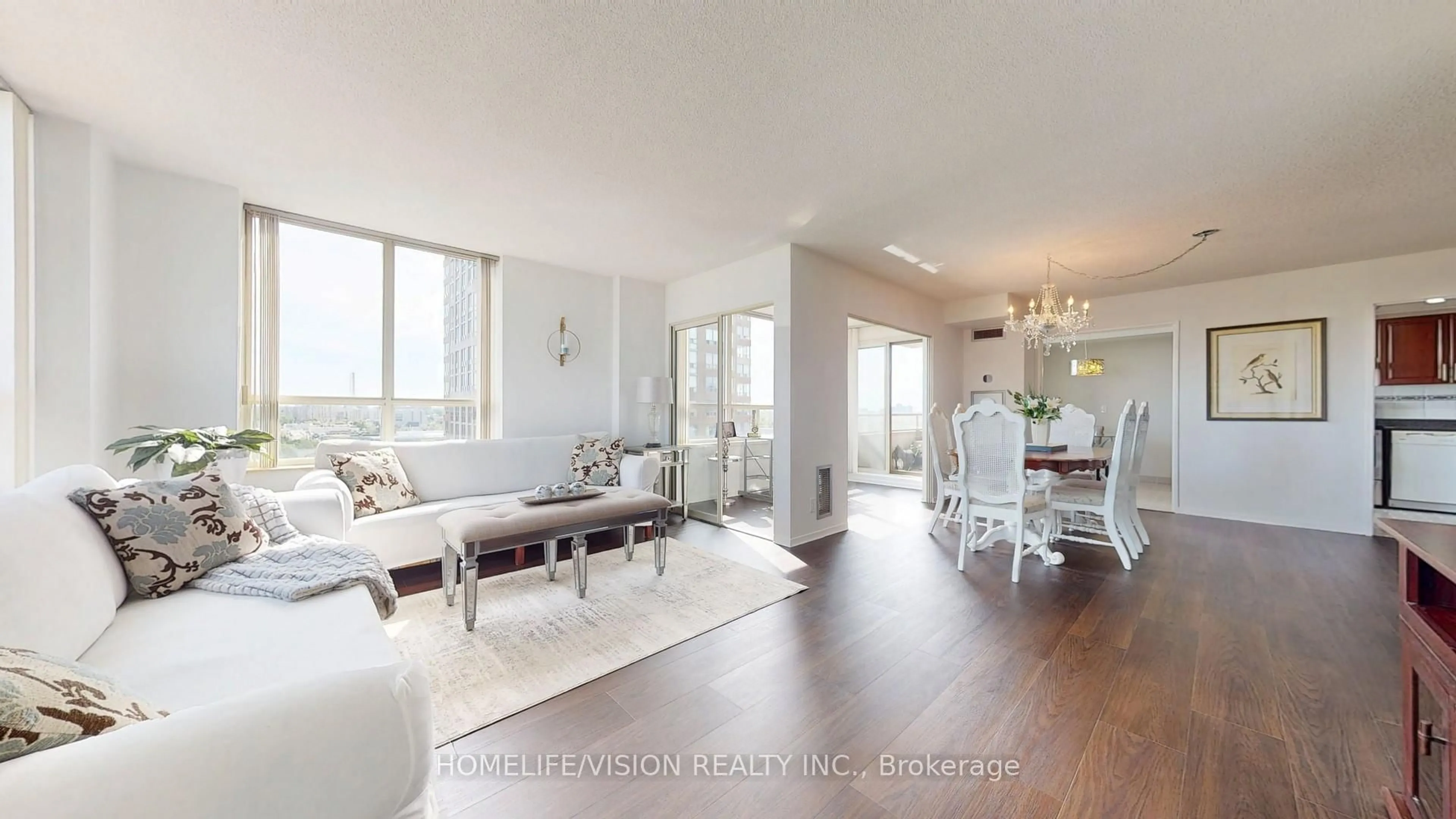 Living room with furniture, wood/laminate floor for 205 Wynford Dr #1706, Toronto Ontario M3C 3P4