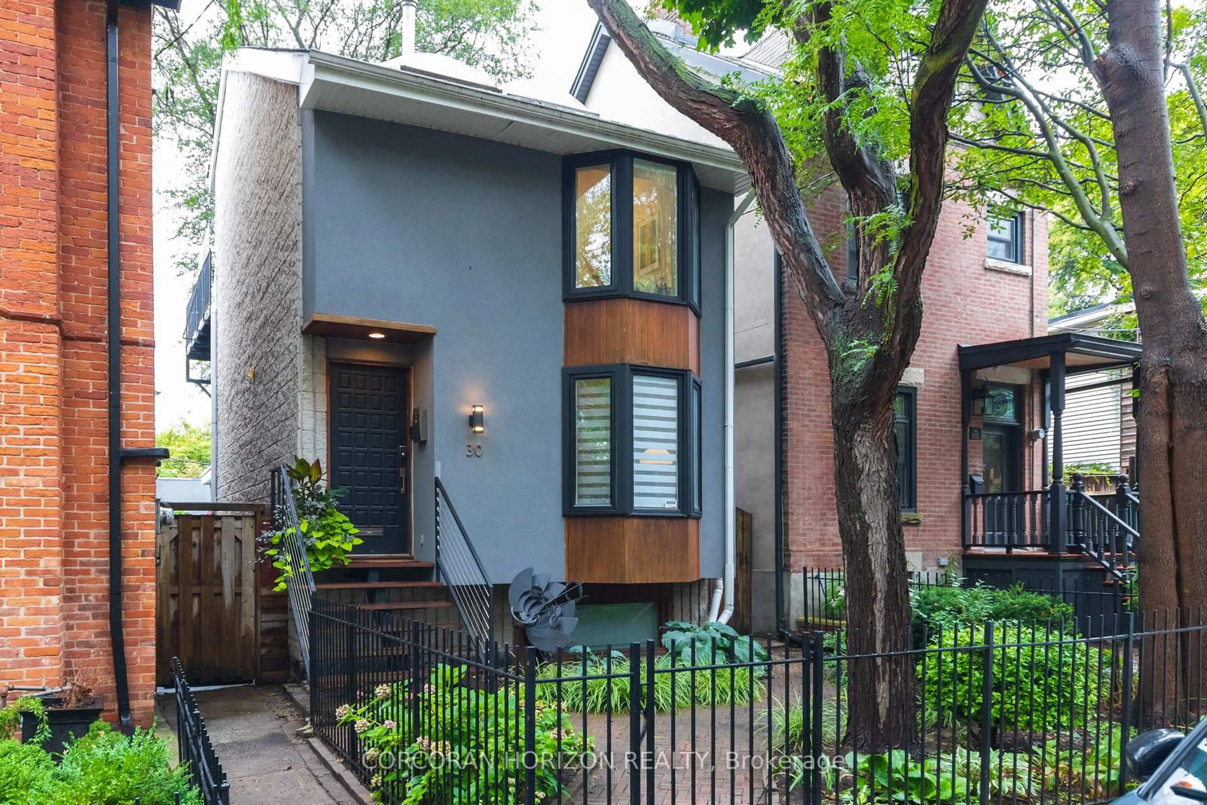 Home with brick exterior material, street for 30 Sword St, Toronto Ontario M5A 3N2