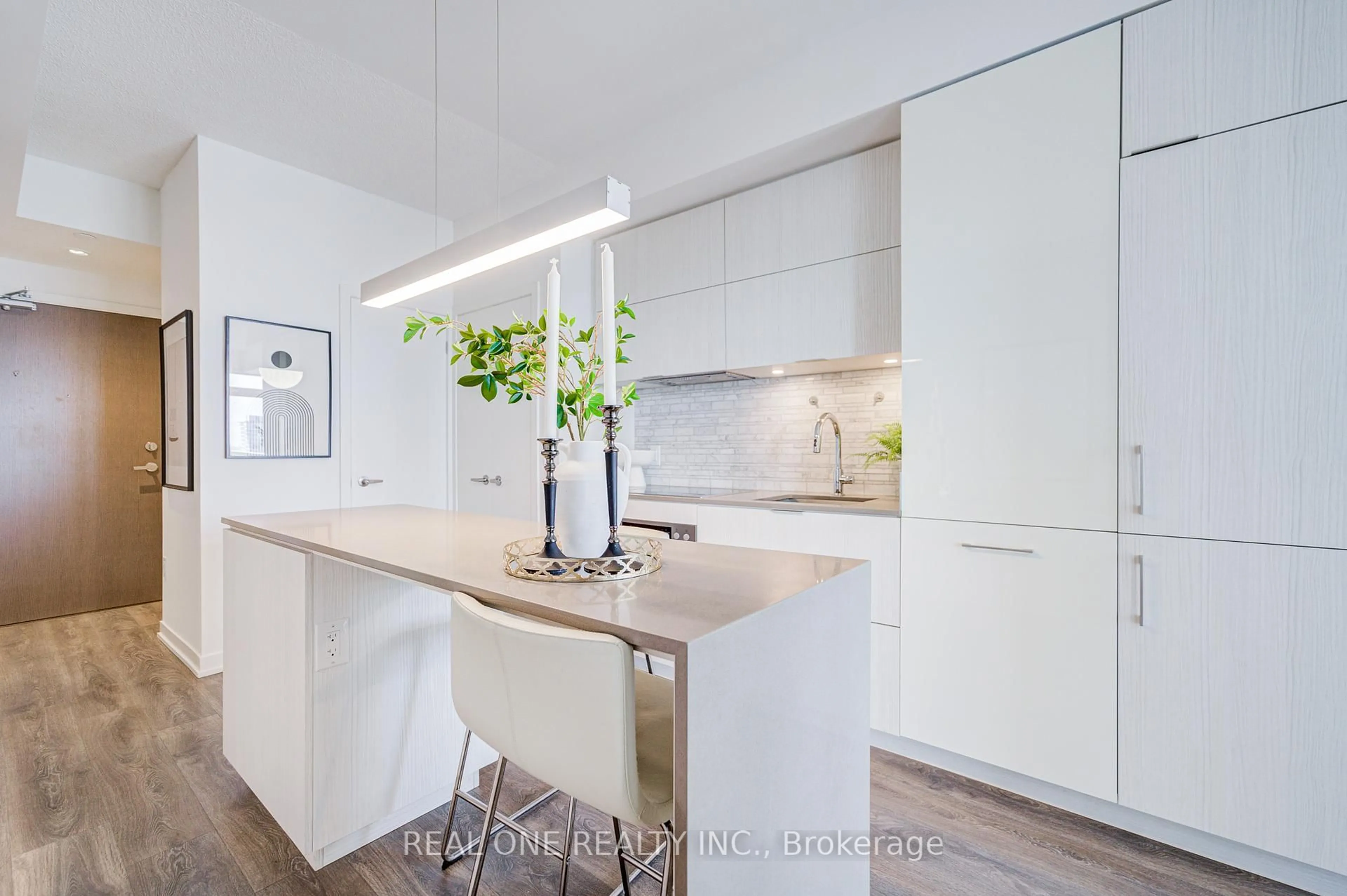 Contemporary kitchen, wood/laminate floor for 20 Richardson St #2602, Toronto Ontario M5A 0S6