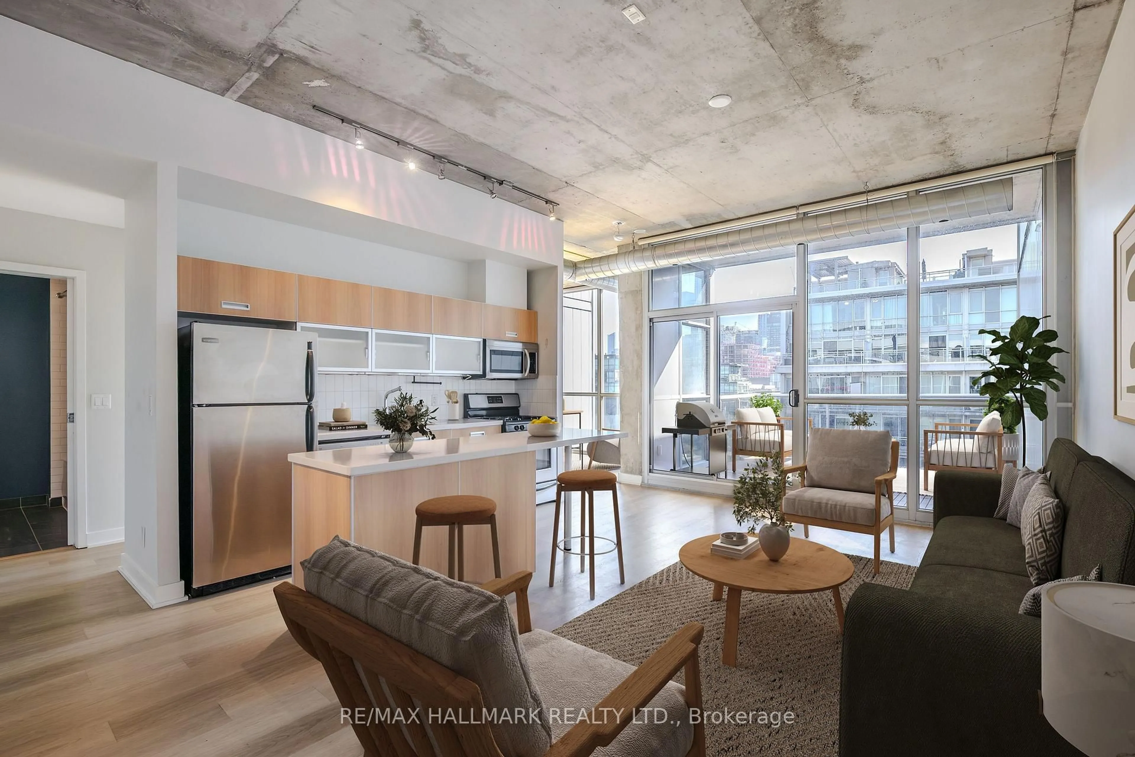 Open concept kitchen, cement floor for 60 Bathurst St #910, Toronto Ontario M5V 2P4