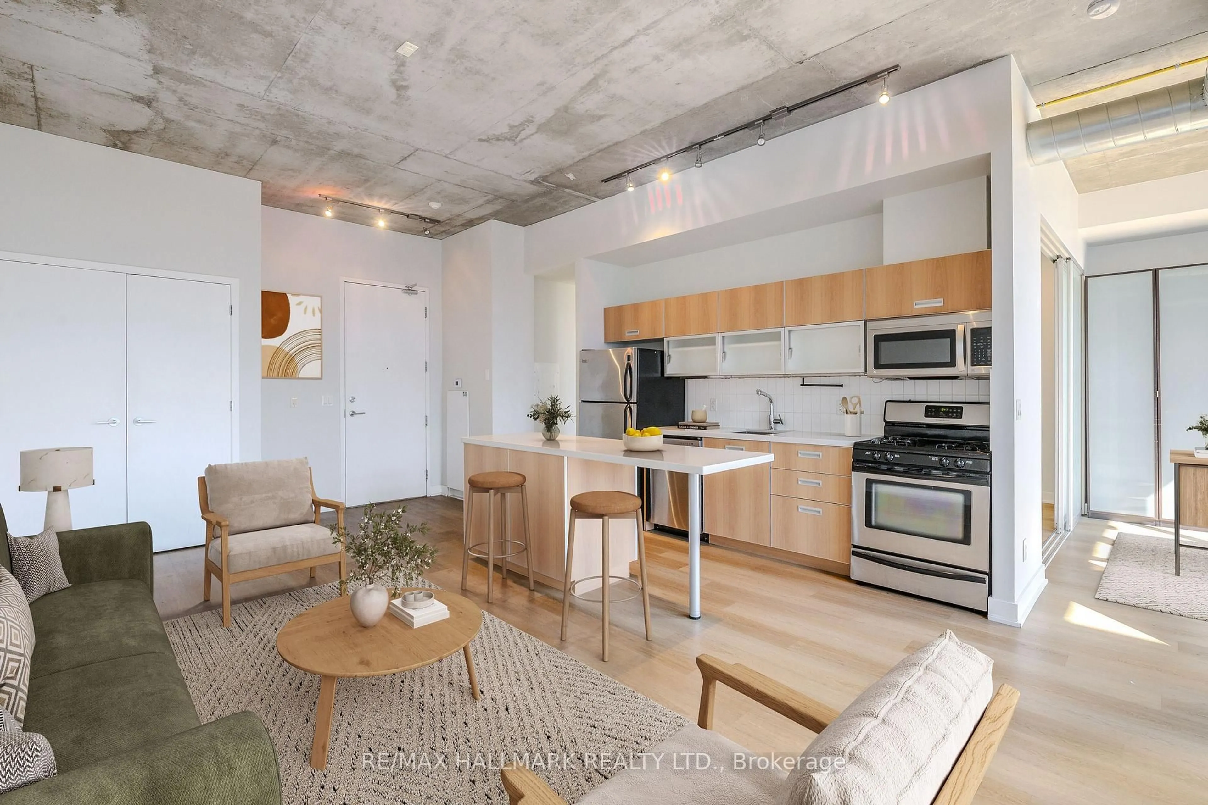 Open concept kitchen, cement floor for 60 Bathurst St #910, Toronto Ontario M5V 2P4