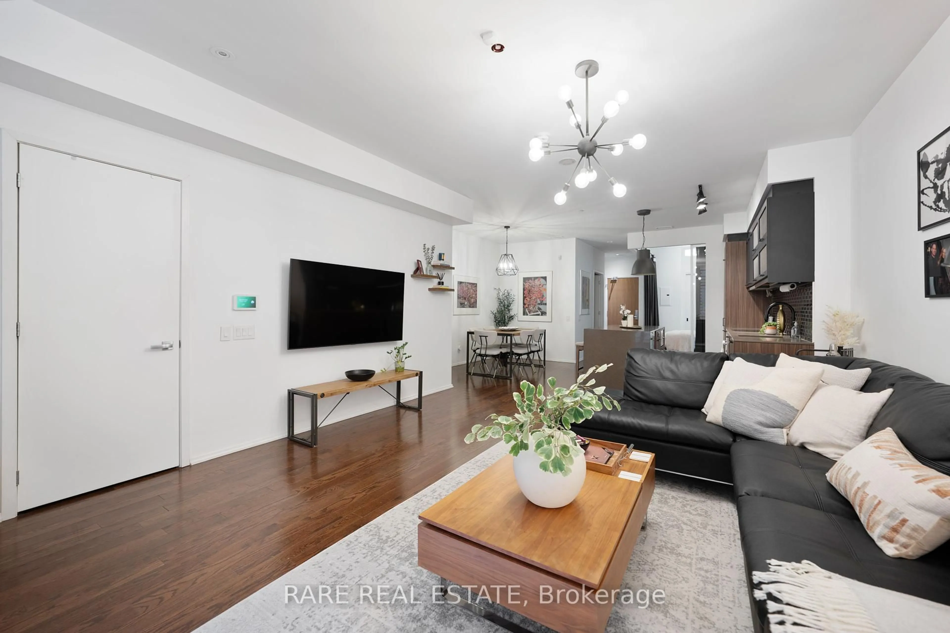 Living room with furniture, wood/laminate floor for 16 Loretto Lane, Toronto Ontario M5S 0B7