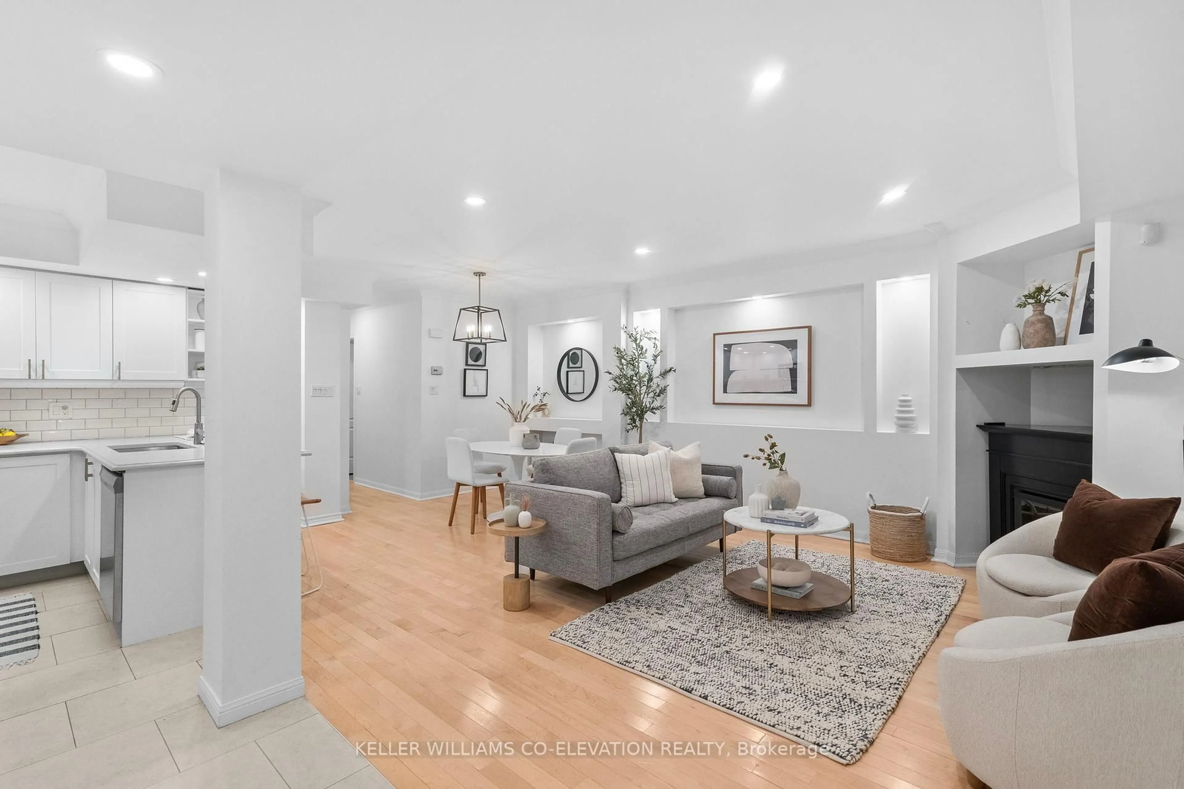 Living room with furniture, wood/laminate floor for 11 Shank St #1102, Toronto Ontario M6J 3W9