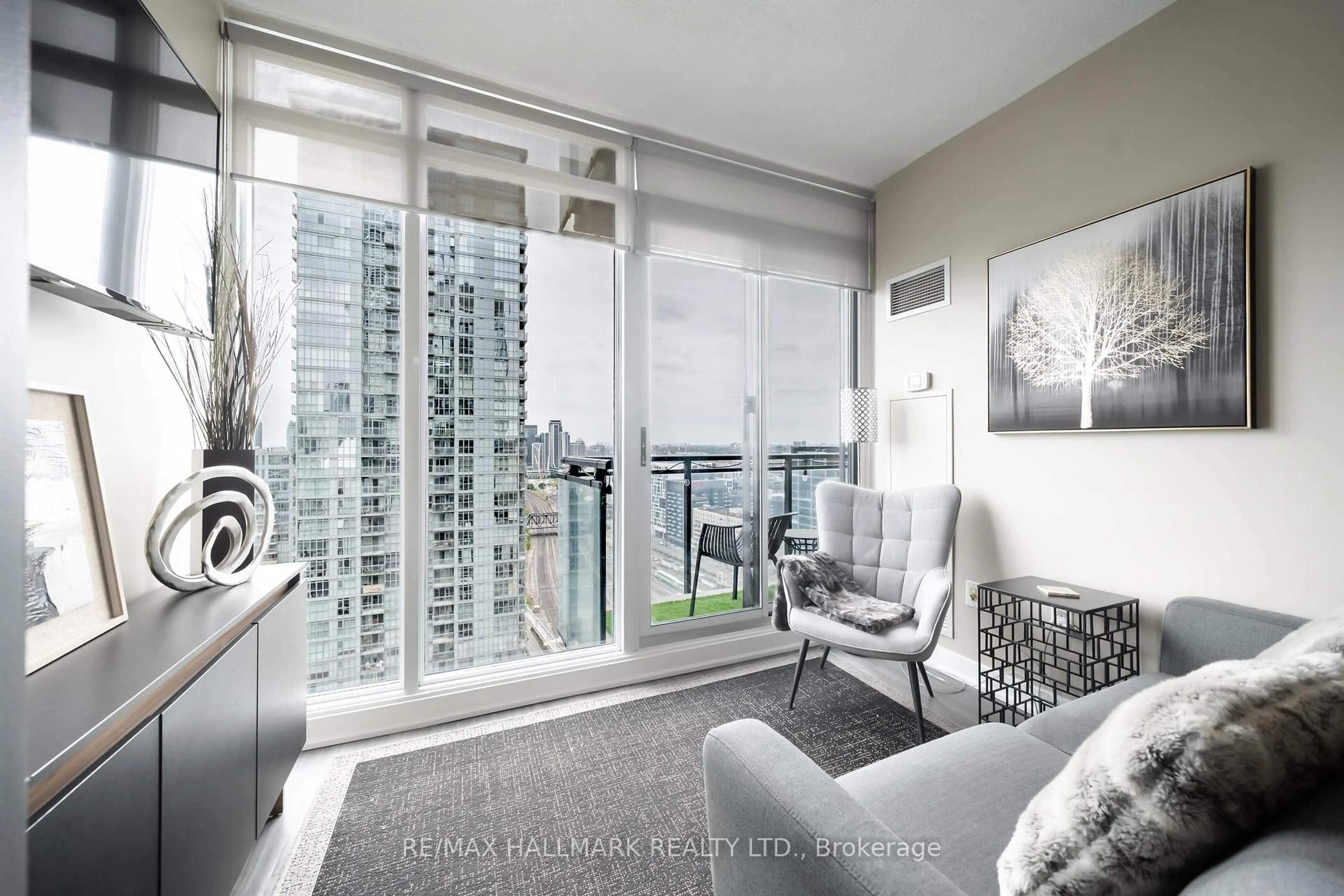Living room with furniture, unknown for 25 Capreol Crt #3008, Toronto Ontario M5V 3Z7