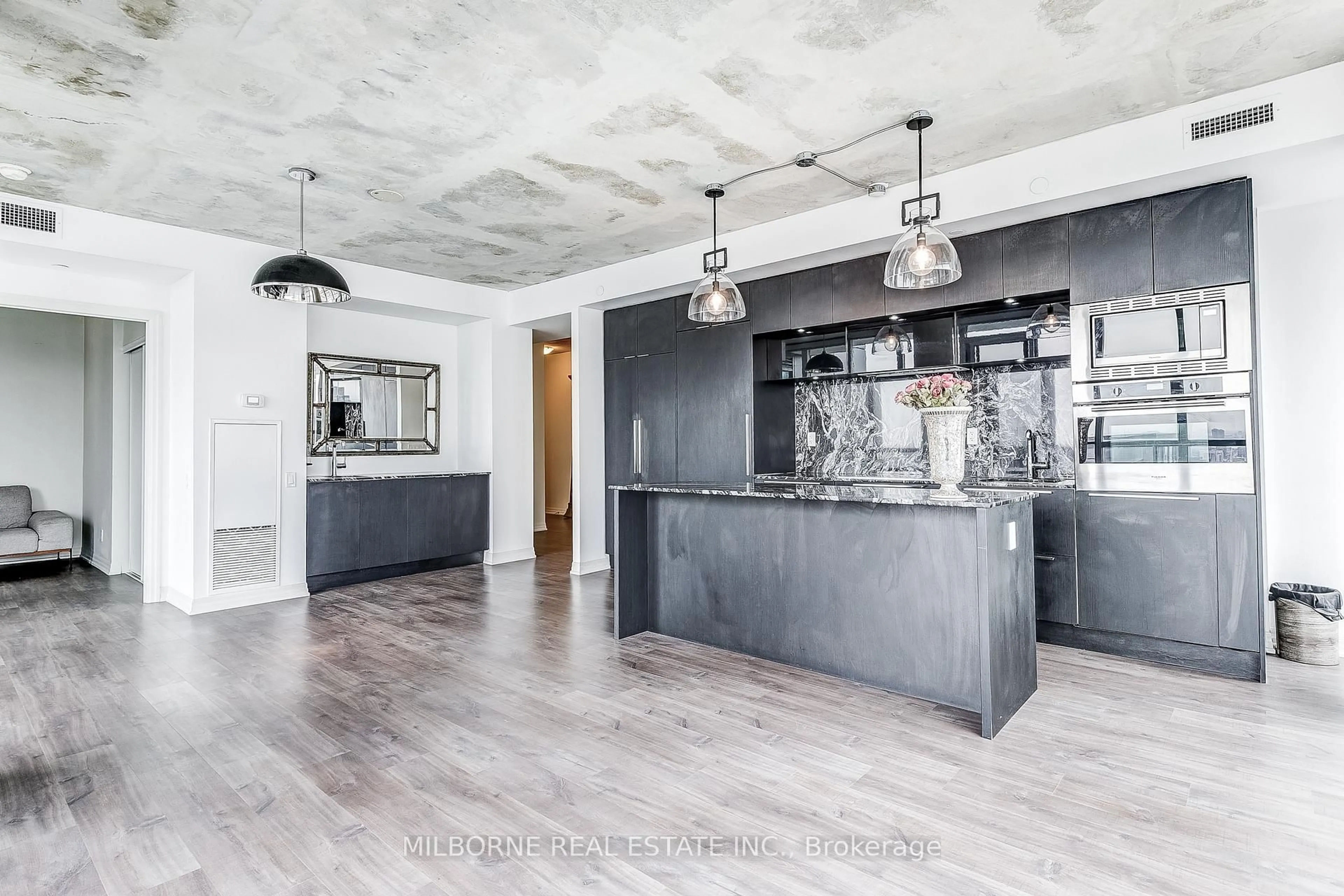 Open concept kitchen, cement floor for 88 Blue Jays Way #4005, Toronto Ontario M5V 2G3