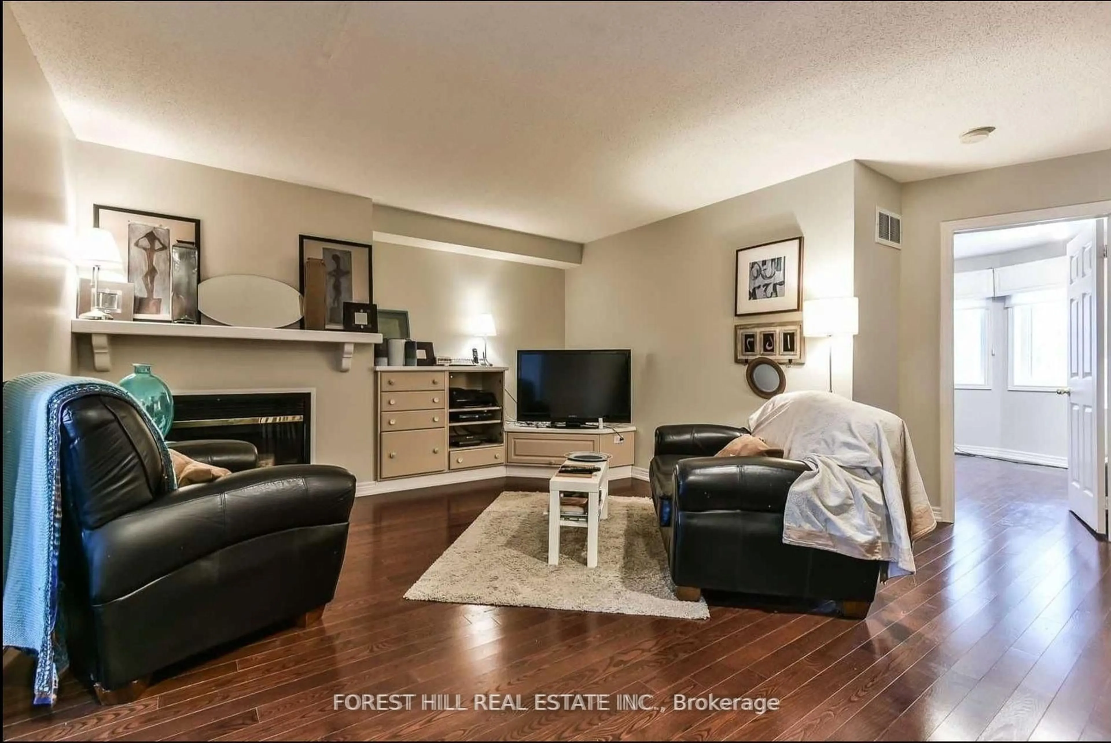 Living room with furniture, wood/laminate floor for 10 Horsham Ave, Toronto Ontario M2N 1Z7
