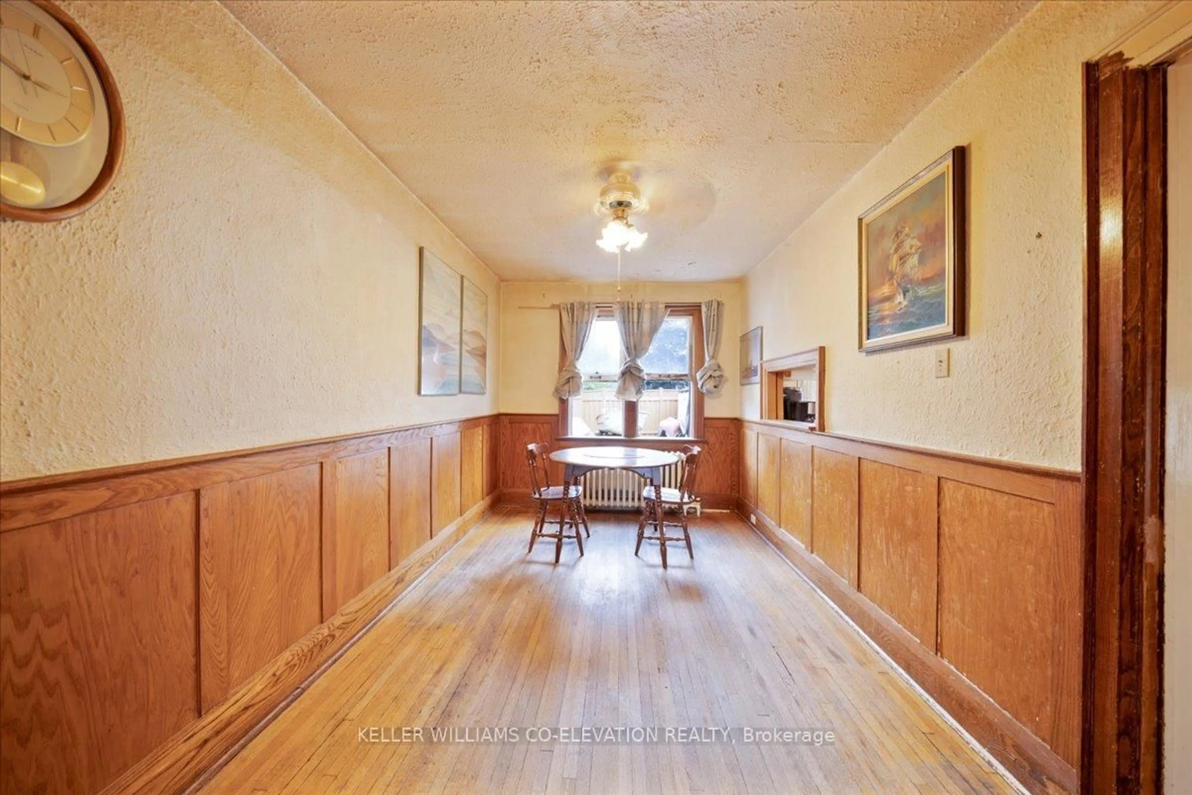 Dining room, wood/laminate floor for 149 Alameda Ave, Toronto Ontario M6C 3X1