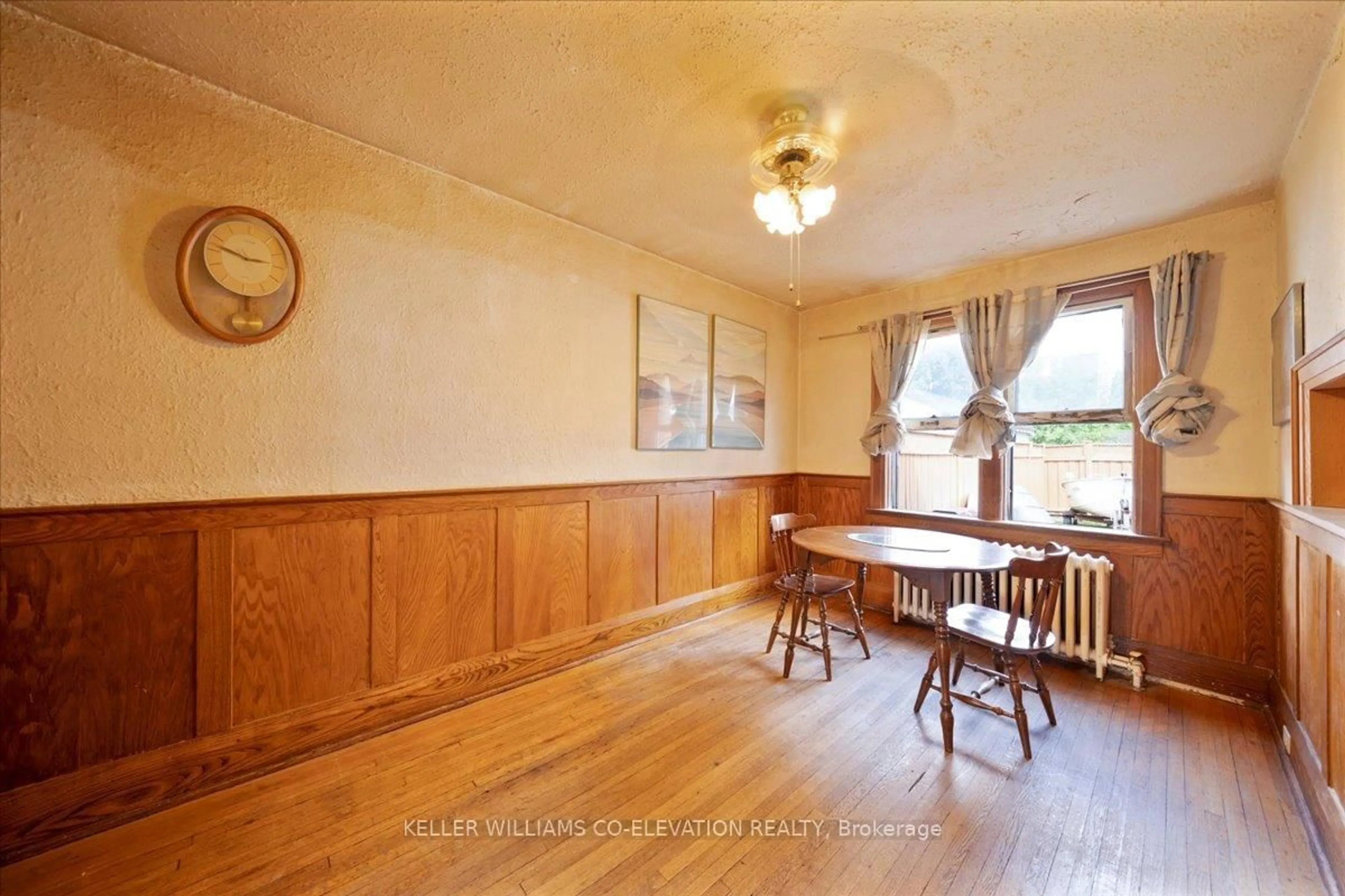 Dining room, wood/laminate floor for 149 Alameda Ave, Toronto Ontario M6C 3X1